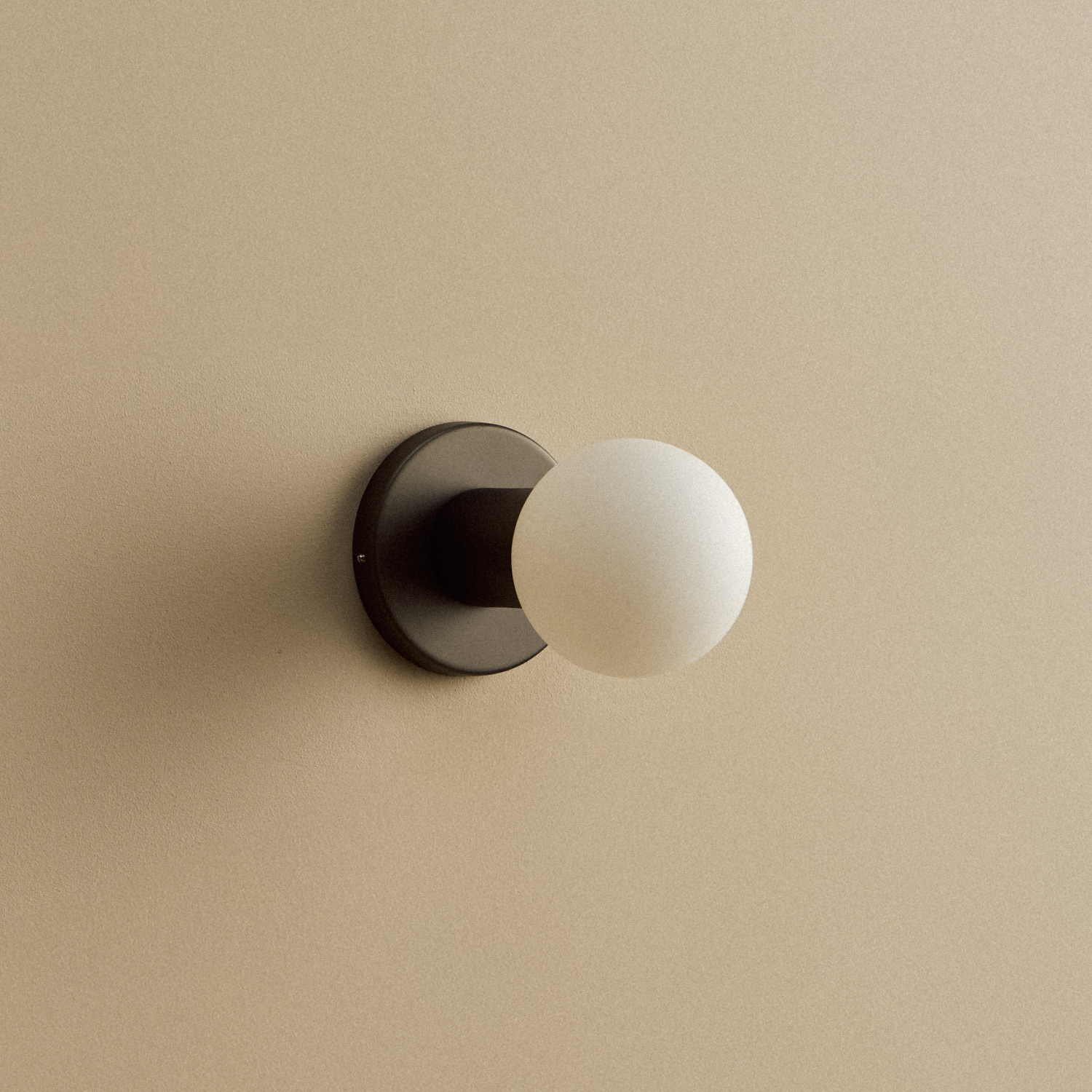 Tala Lochan Wall Light in Graphite + Sphere III shown illuminated (view 2)