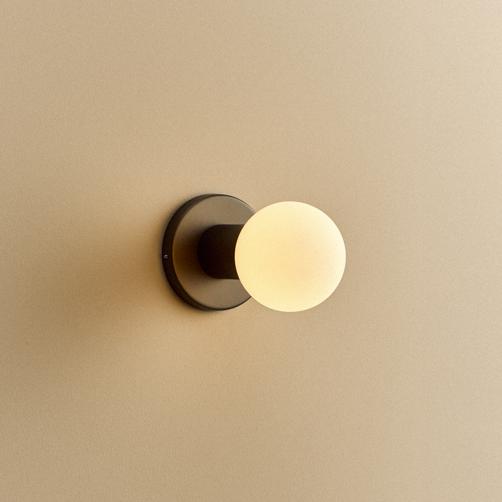 Tala Lochan Wall Light in Graphite + Sphere III shown illuminated