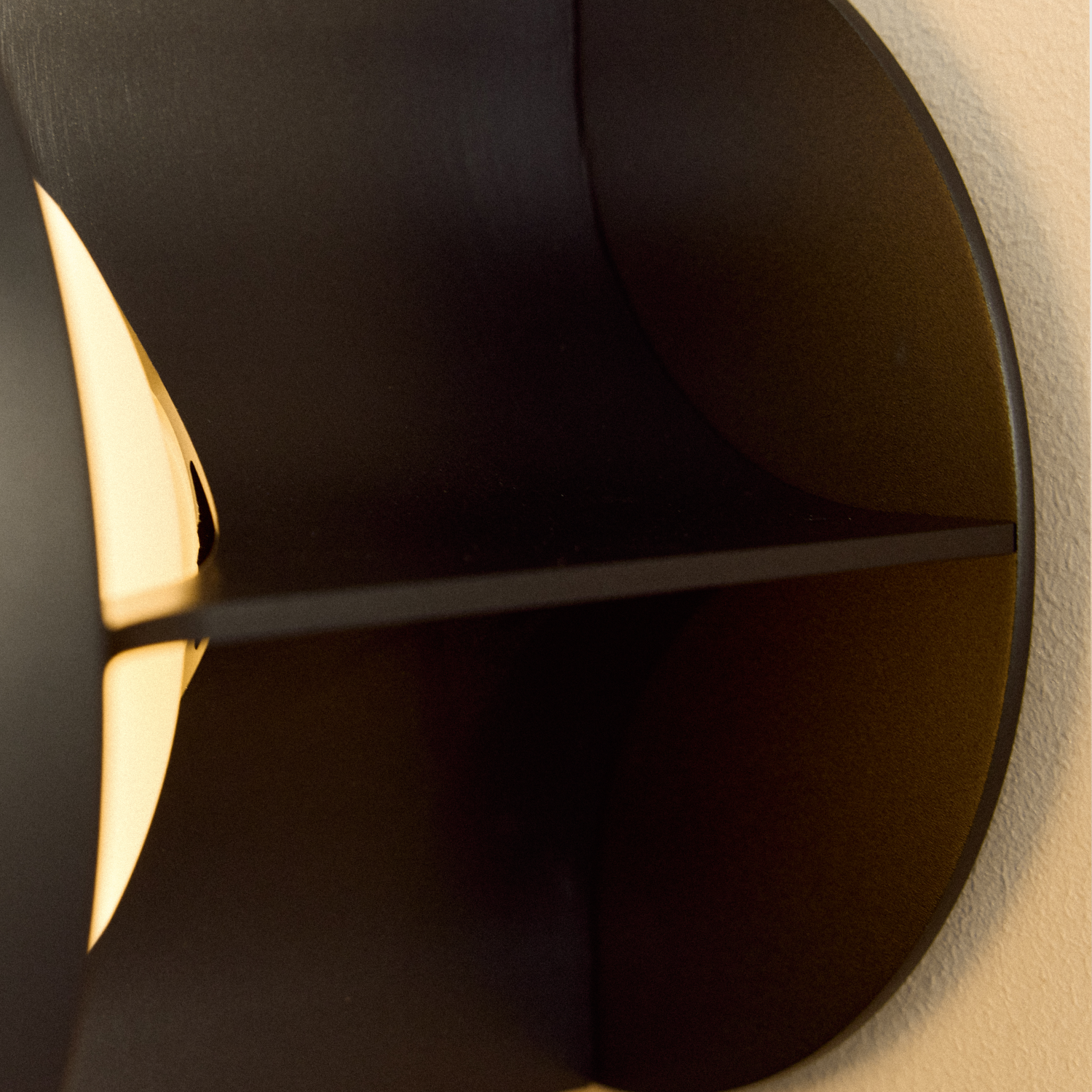 Tala Loop Wall Light in Dark Grey + Sphere IV close-up detail of the finish (view 2)