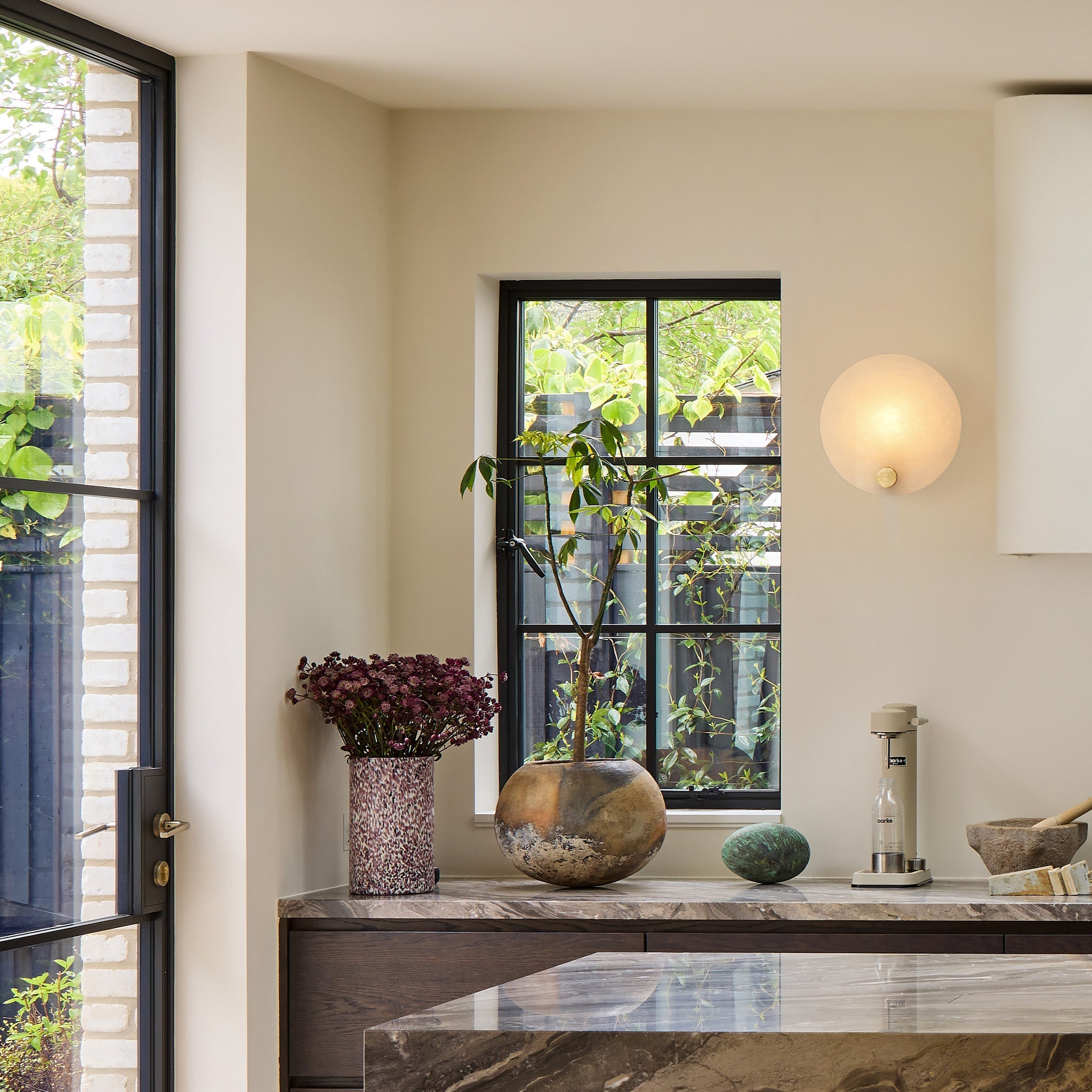 Tala Magma Wall Light in a styled interior setting