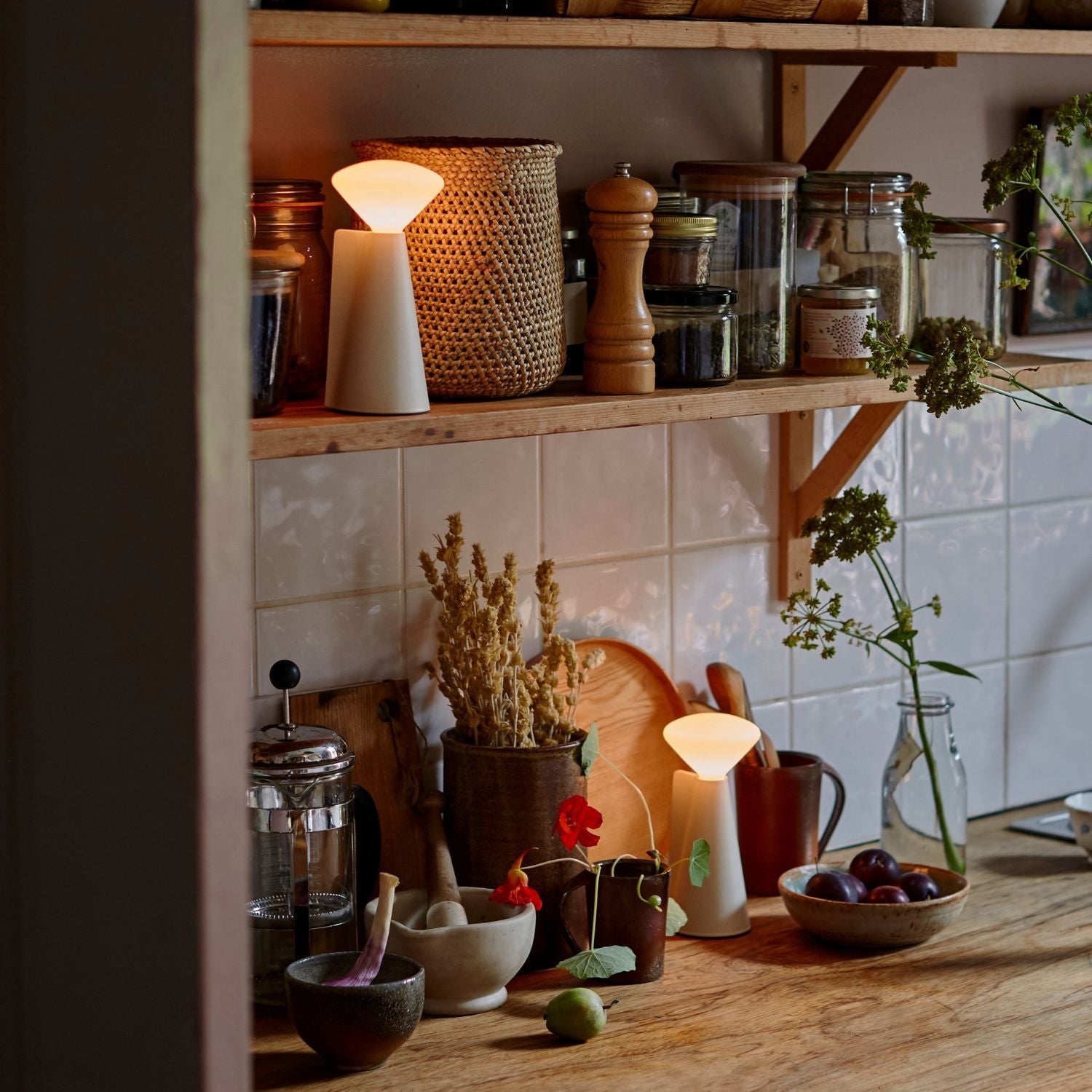 Tala Mantle Portable Lamp in Stone White in a styled interior setting