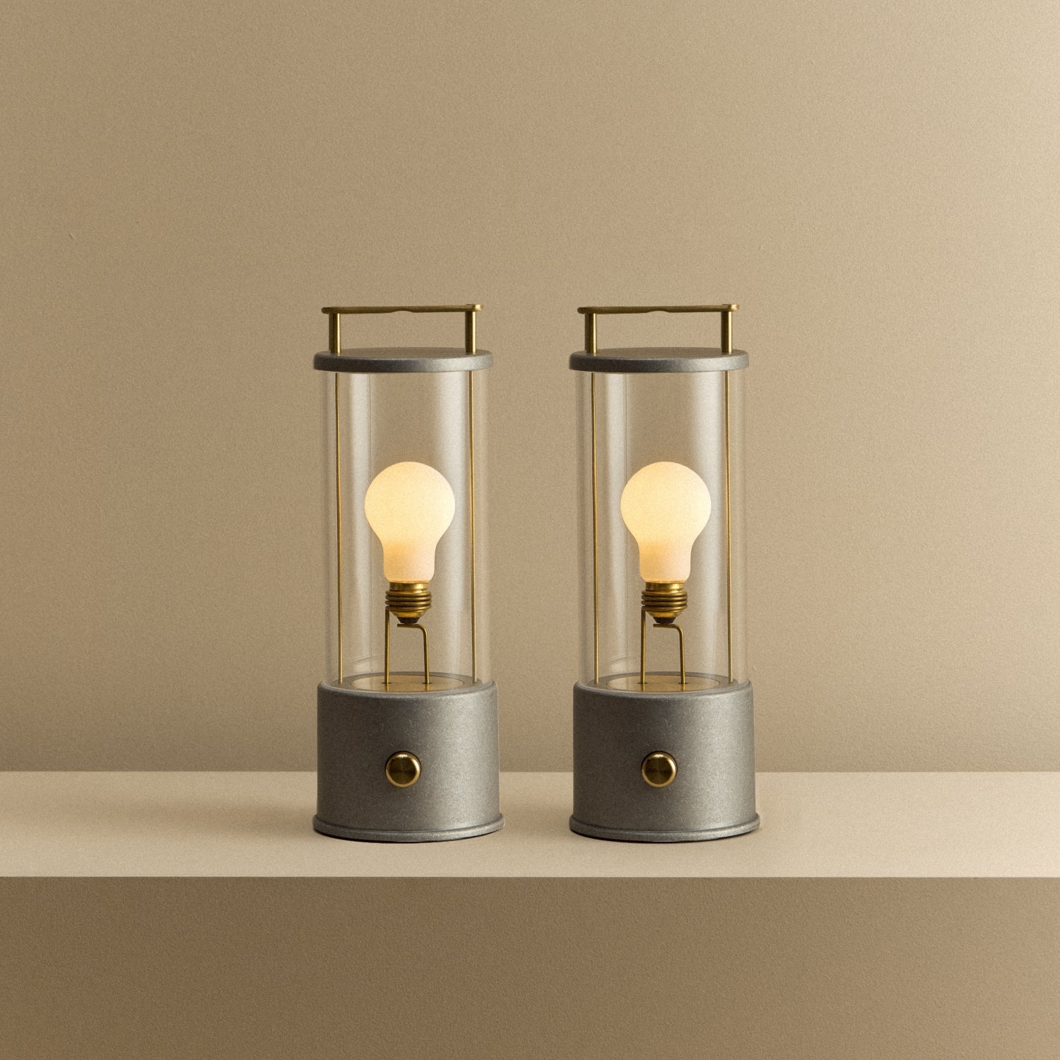 Tala The Rugged Muse 1.0 Portable Lamp in Raw Aluminium - Set of 2 shown illuminated