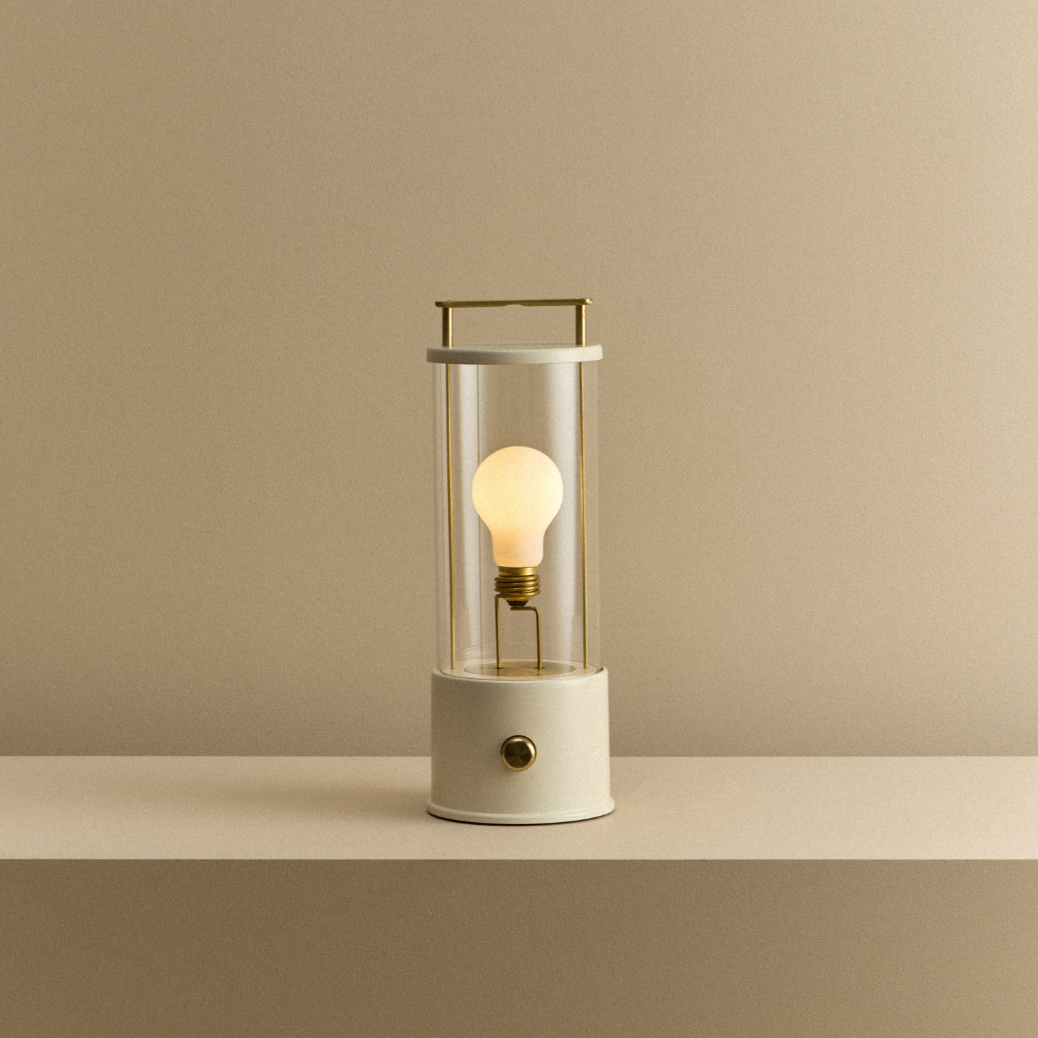 Tala The Muse Portable Lamp in Candlenut White shown illuminated