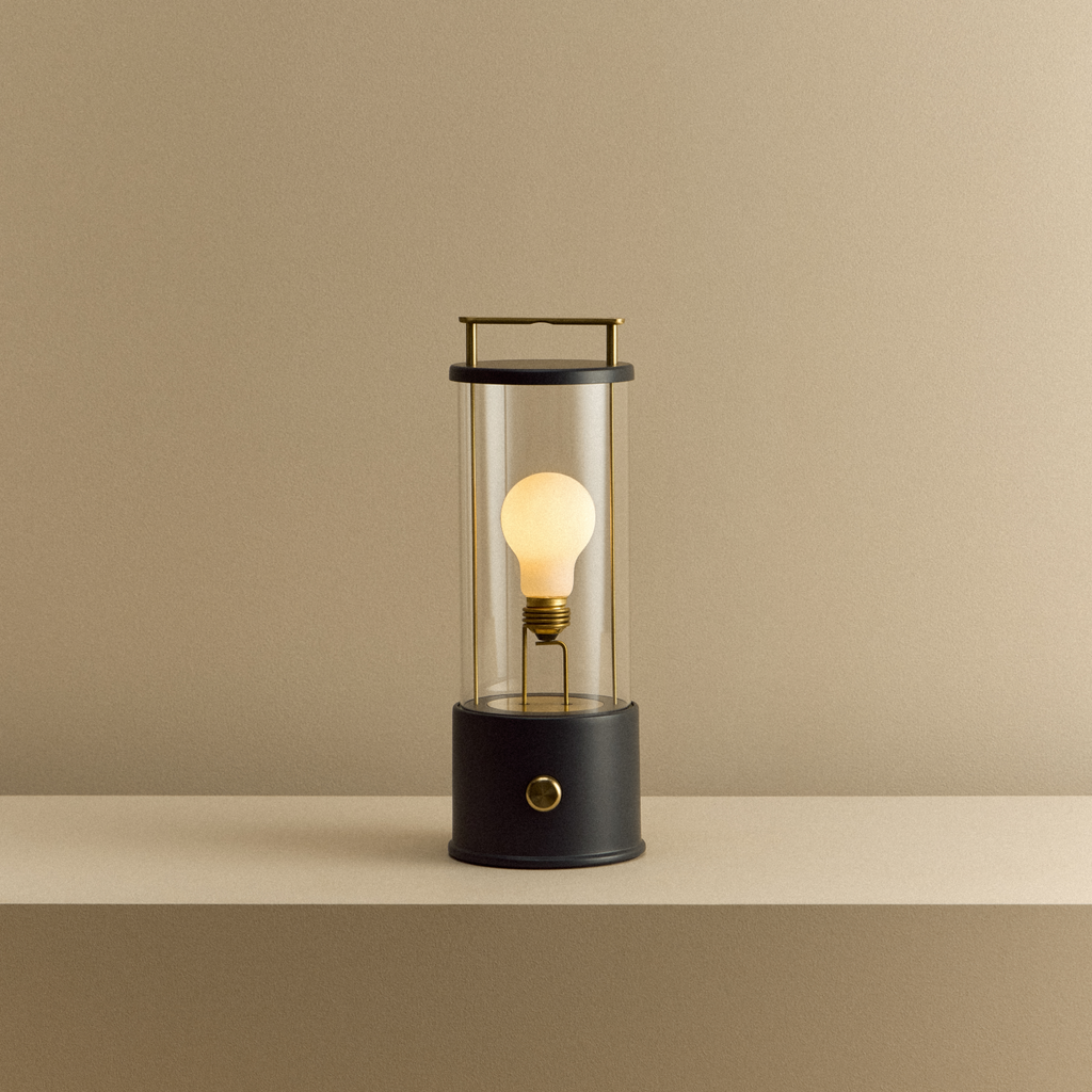 Tala The Muse Portable Lamp in Hackles Black shown illuminated
