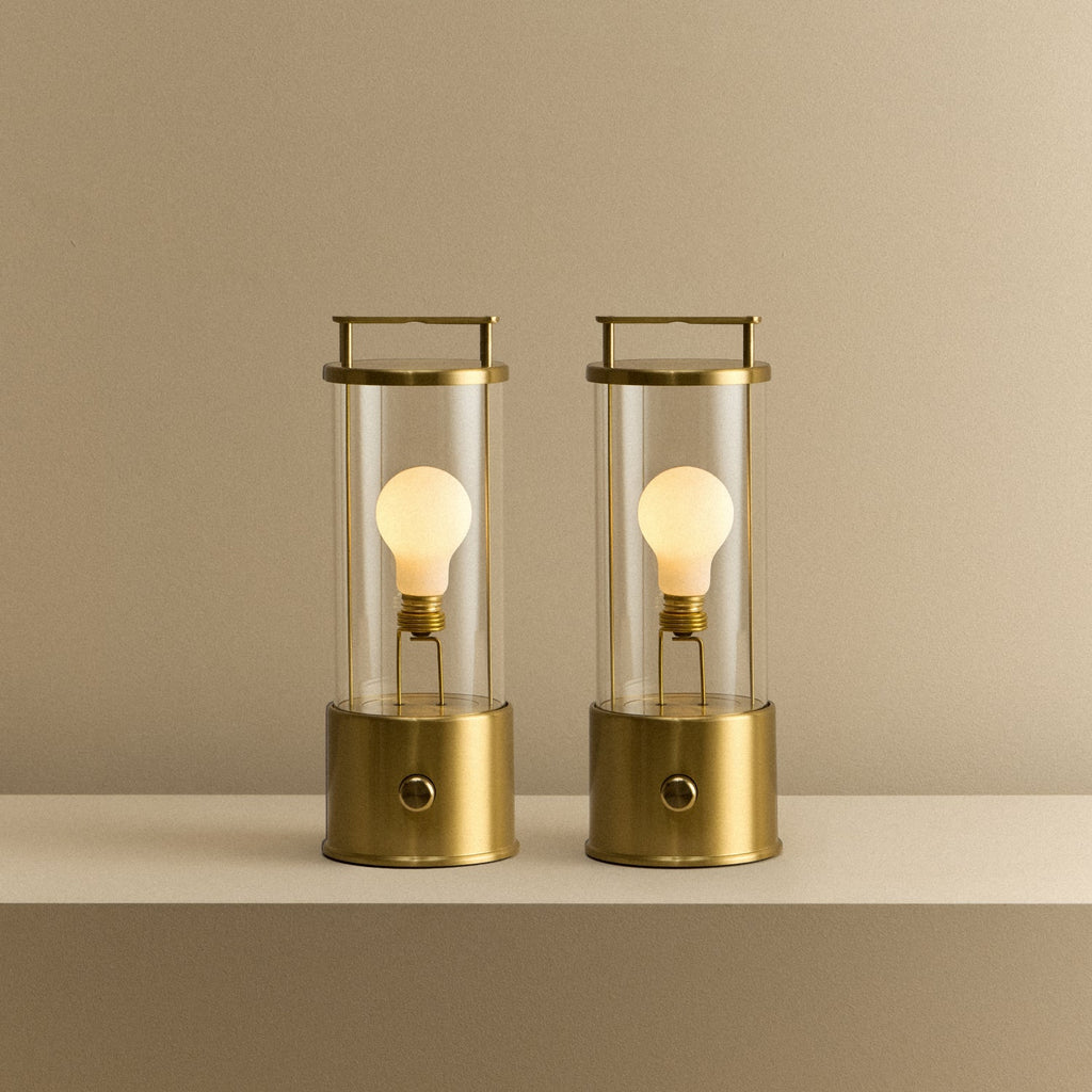 Tala The Muse 1.0 Portable Lamp in Solid Brass - Set of 2 shown illuminated