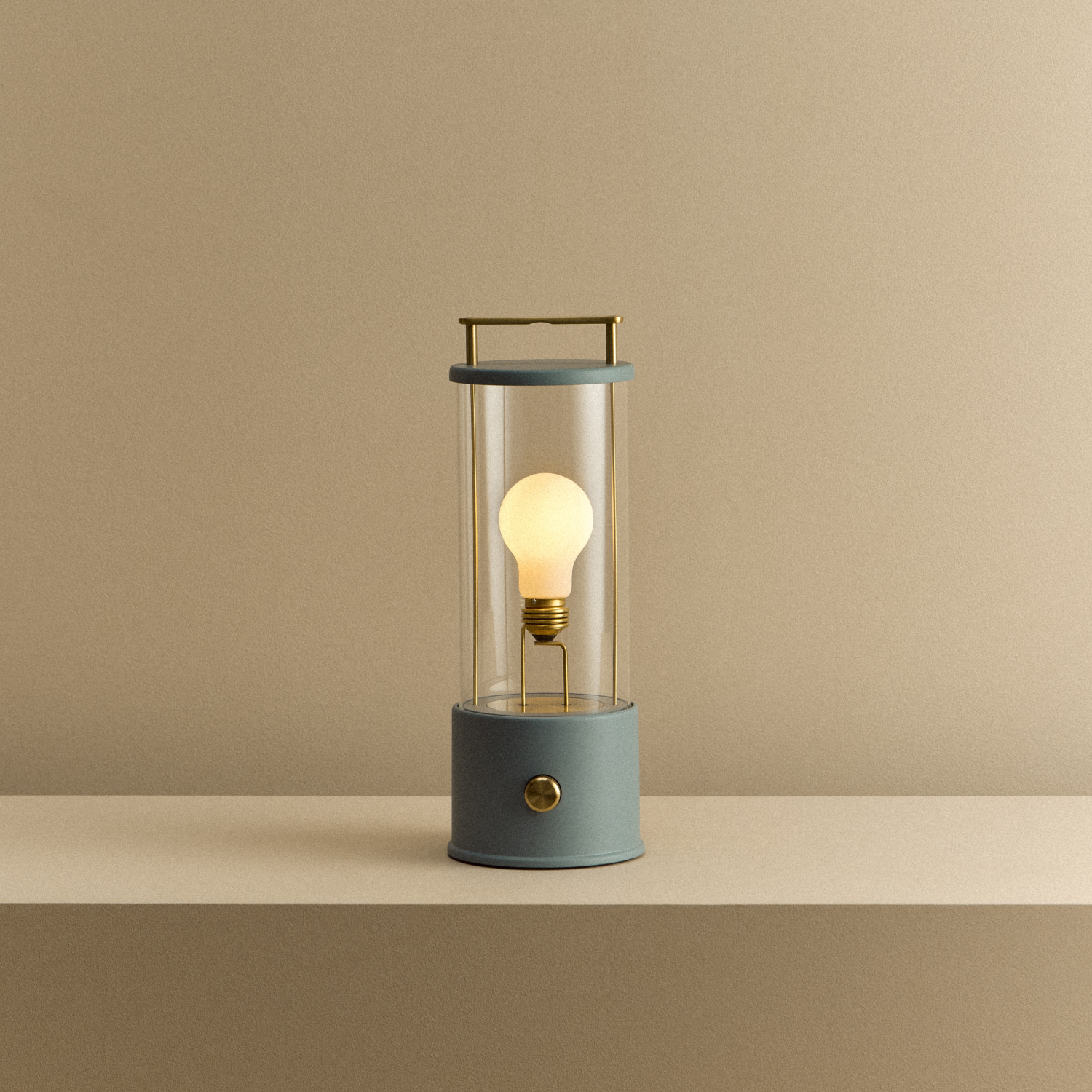 Tala The Muse 1.0 Portable Lamp in Selvedge Blue shown illuminated
