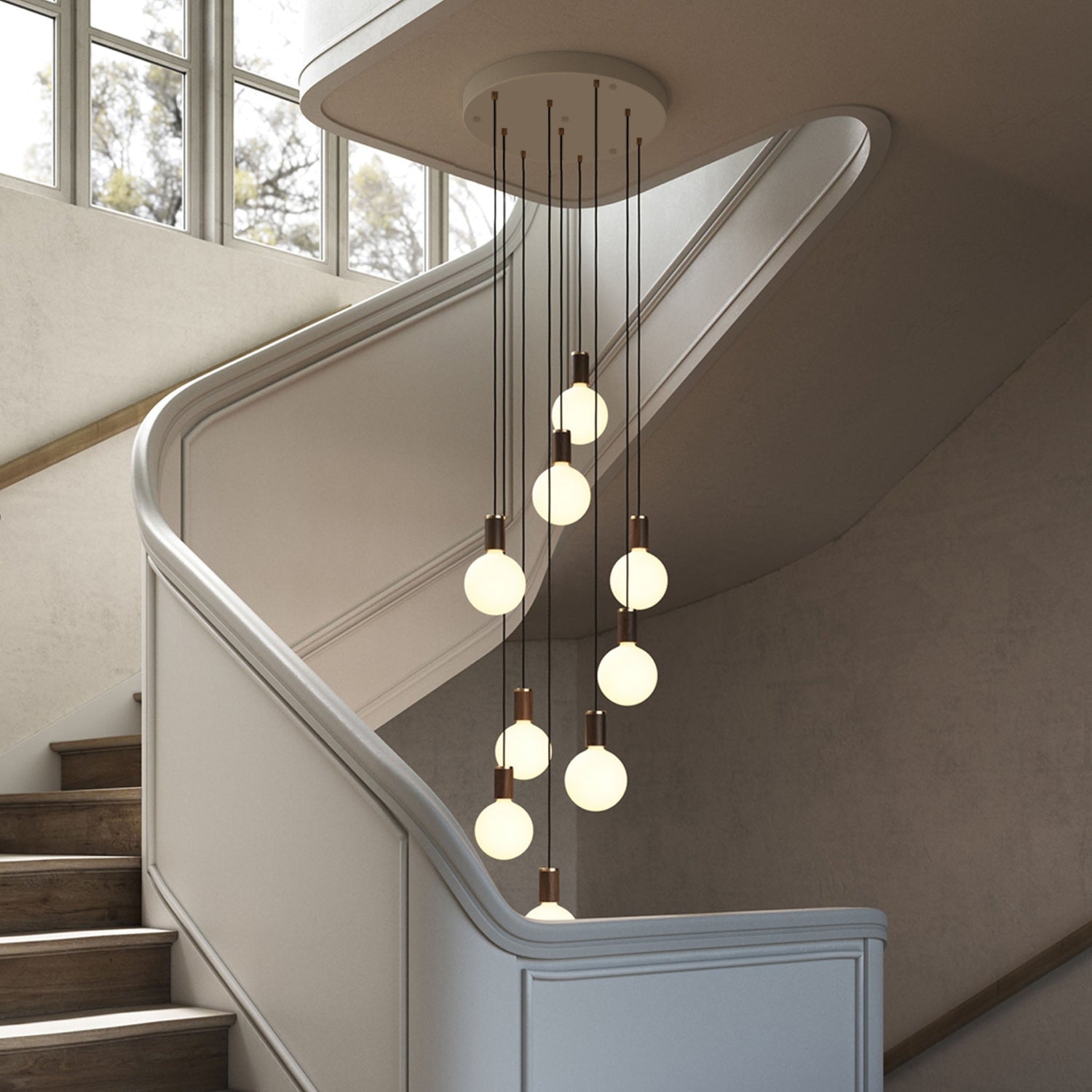 Tala Nine Pendant in Walnut + Sphere IV in a styled interior setting