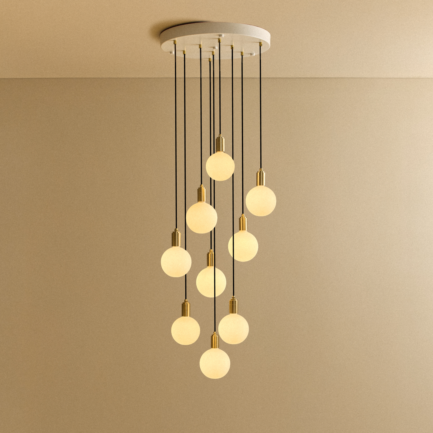 Tala Nine Pendant in Brass + Sphere IV shown illuminated