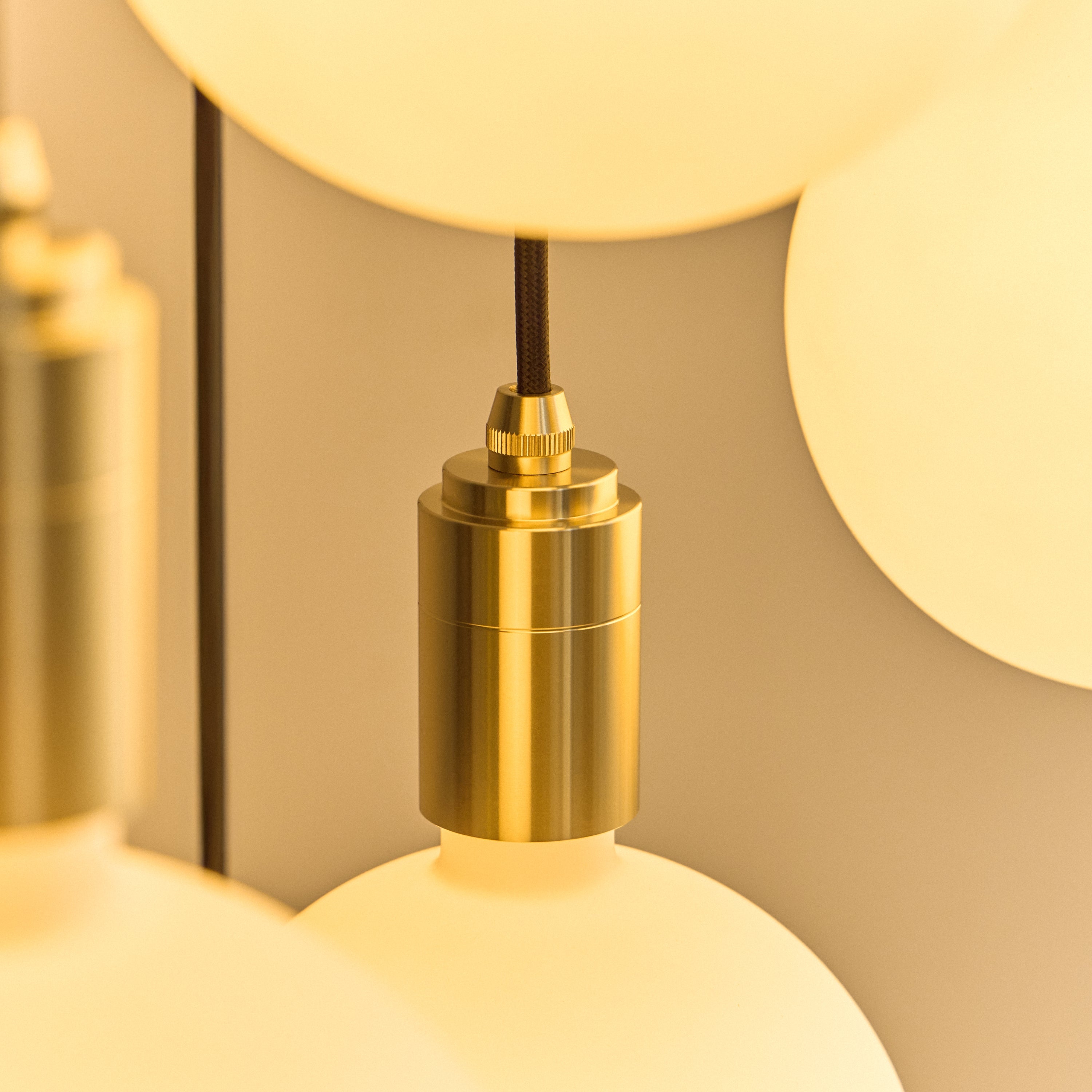 Tala Porcelain II Pendant Light in Brass close-up detail of the finish