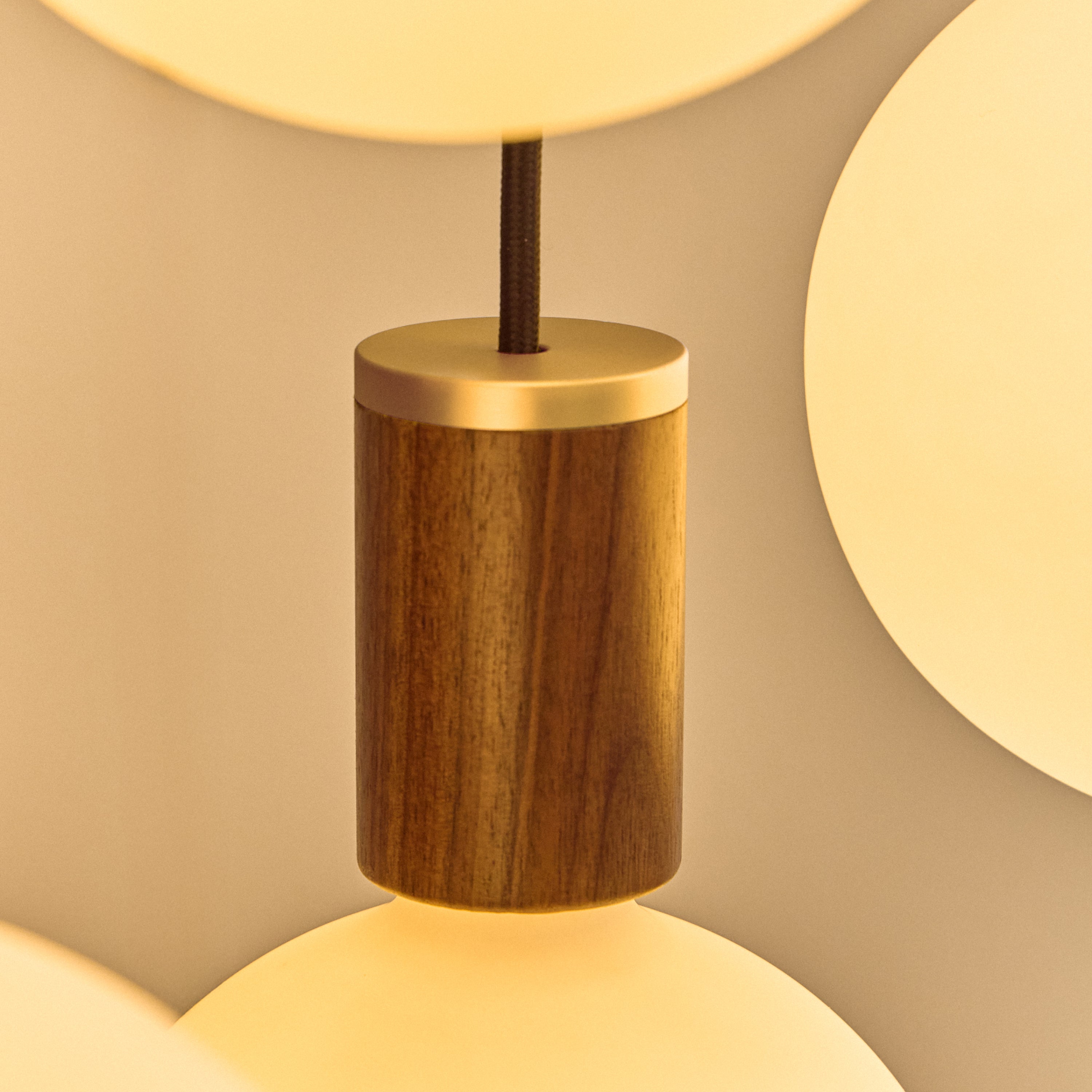 Tala Sphere IV Pendant Light in Walnut close-up detail of the finish