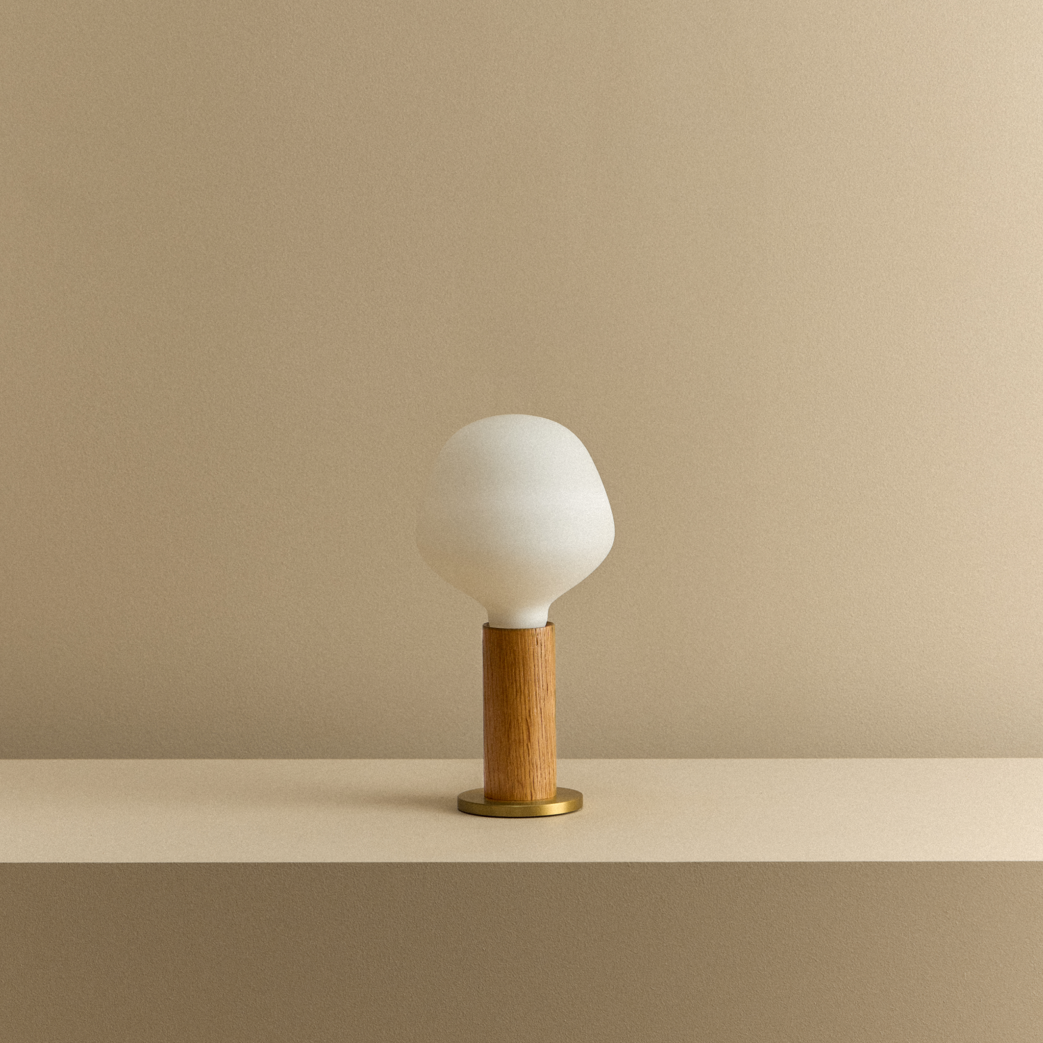 Tala Knuckle Table Lamp in Oak + Enno shown unlit