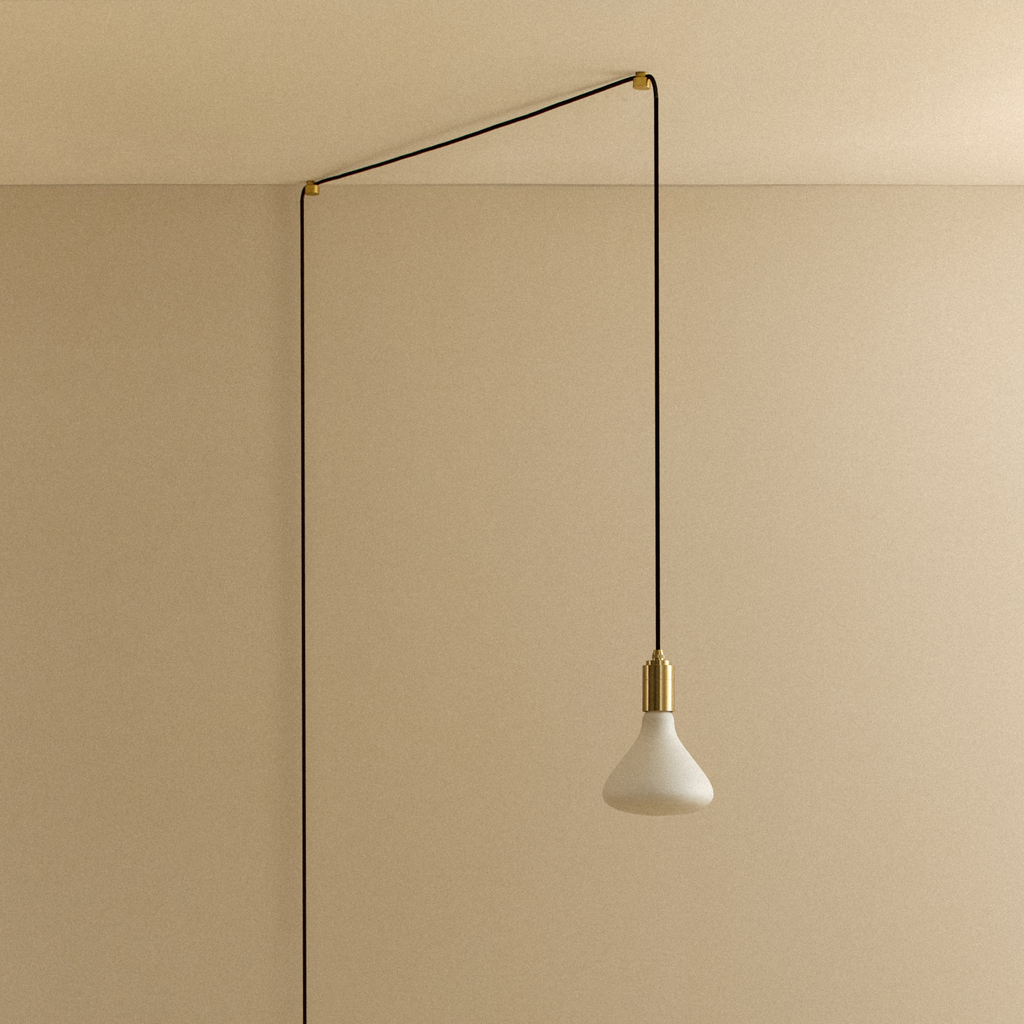 Tala Noma Plug-In Pendant in Brass shown unlit