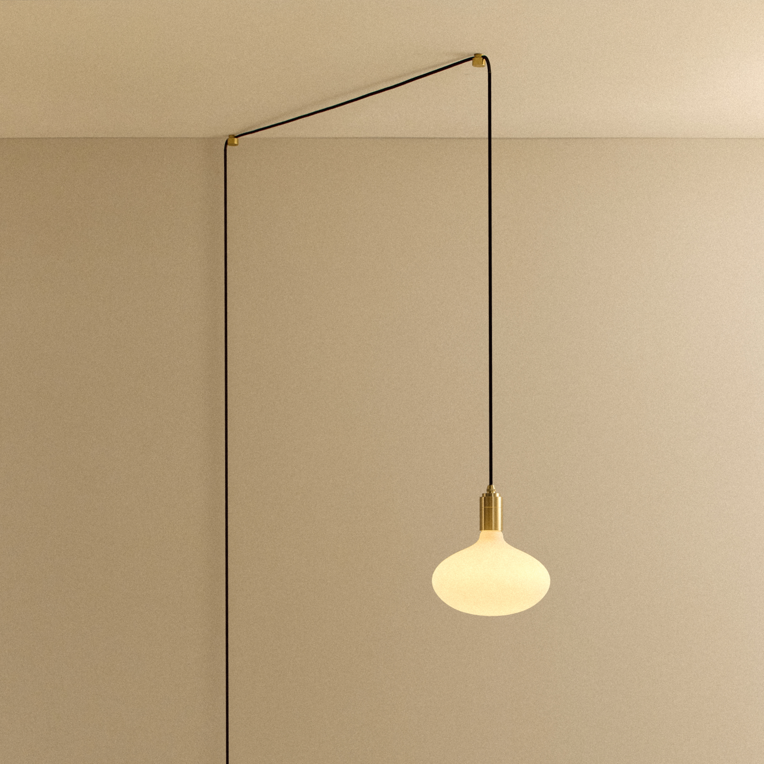 Tala Oval II Plug-In Pendant in Brass shown illuminated