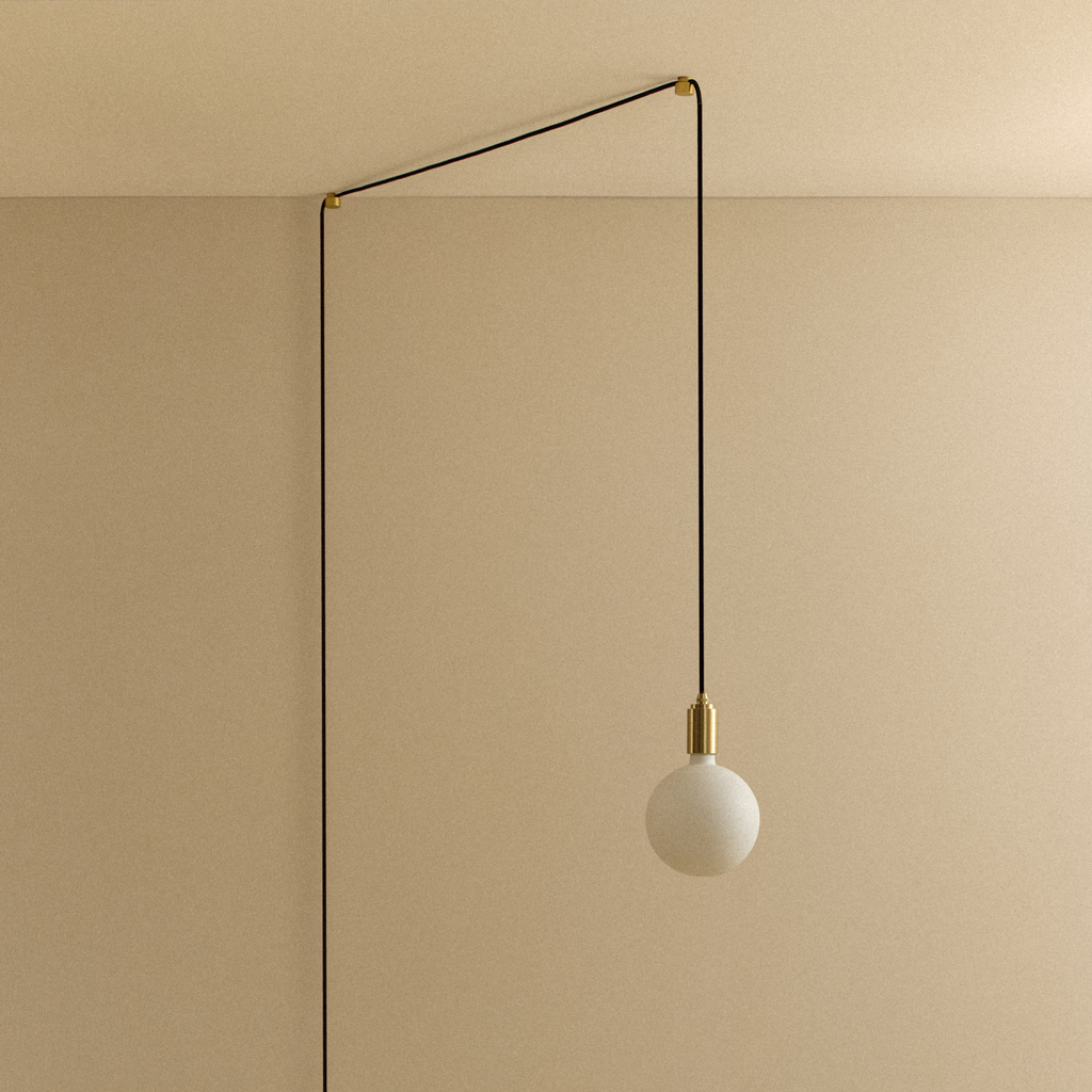 Tala Sphere IV Plug-In Pendant in Brass shown unlit