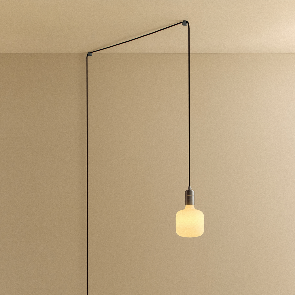 Tala Oblo Plug-In Pendant in Graphite shown illuminated