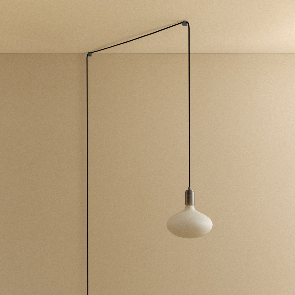 Tala Oval II Plug-In Pendant in Graphite shown unlit