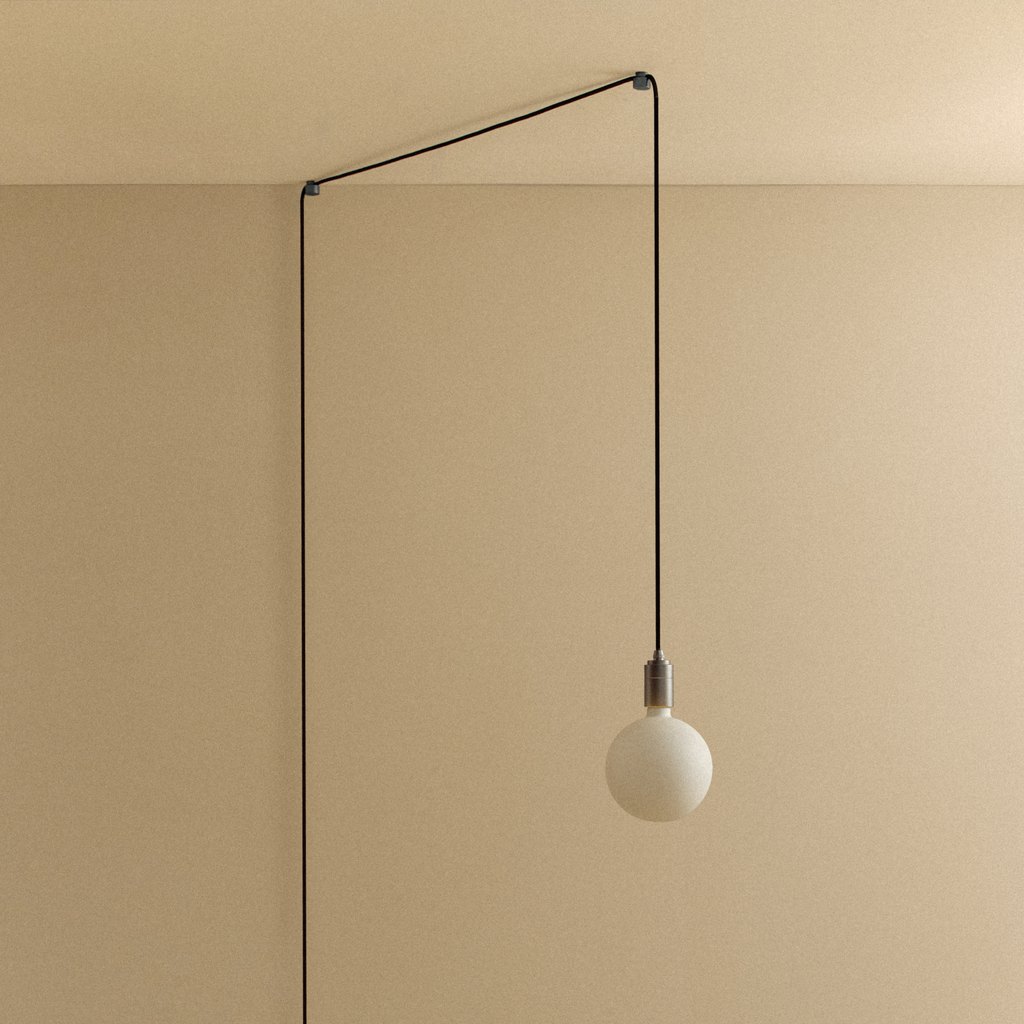 Tala Sphere IV Plug-In Pendant in Graphite shown unlit