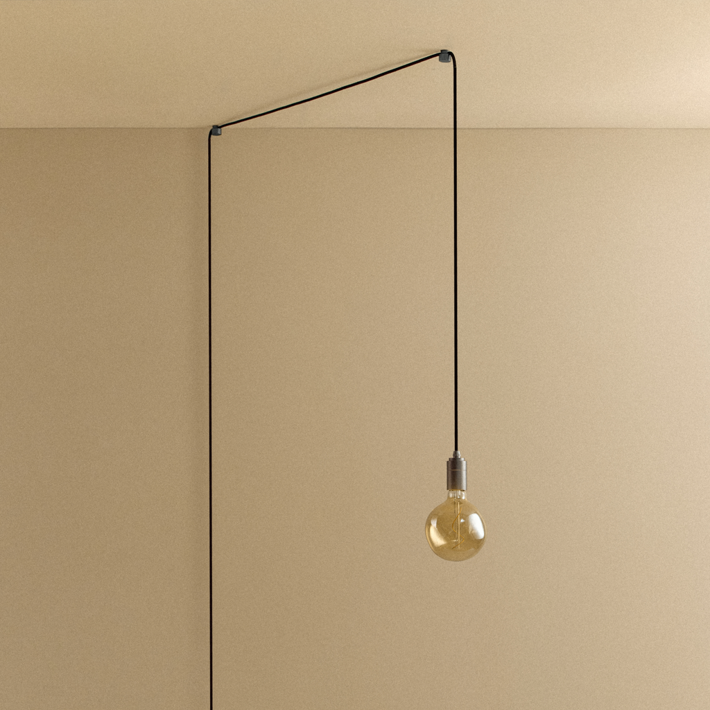 Tala Voronoi I Plug-In Pendant in Graphite shown unlit