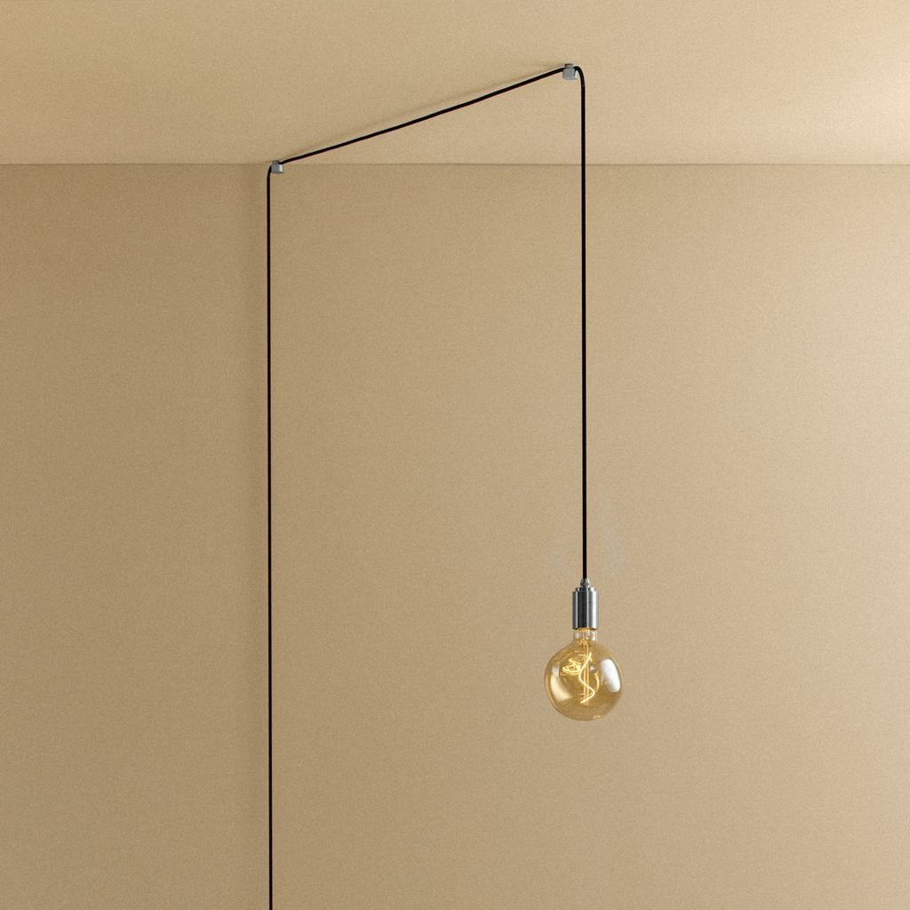 Tala Voronoi I Plug-In Pendant in Stainless Steel shown illuminated