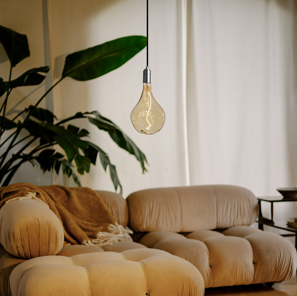 Tala Voronoi II Plug-In Pendant in Stainless Steel in a styled interior setting