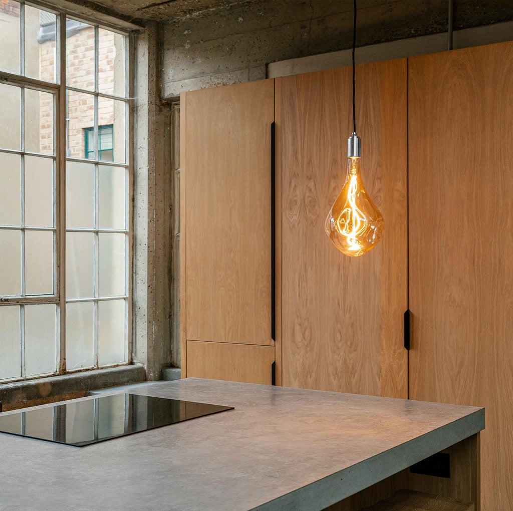 Tala Voronoi III Plug-In Pendant in Stainless Steel in a styled interior setting