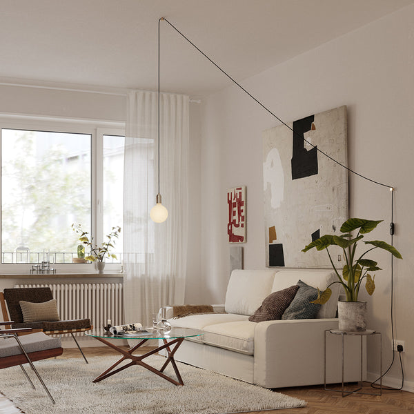 Tala Plug-In Pendant in Brass in a styled interior setting (view 2)