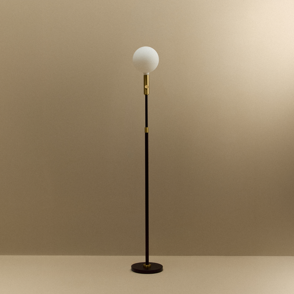 Tala Poise Adjustable Floor Lamp in Brass + Sphere V shown unlit