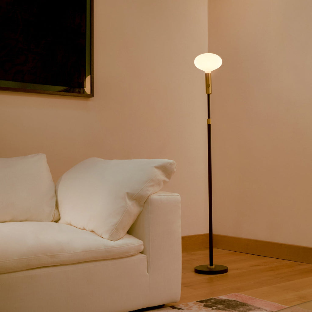 Tala Poise Adjustable Floor Lamp in Brass + Oval II in a styled interior setting (view 2)
