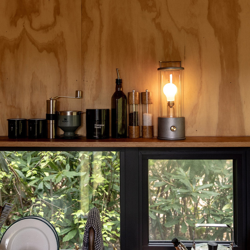 Tala The Rugged Muse Portable Lamp in Raw Aluminium in a styled interior setting