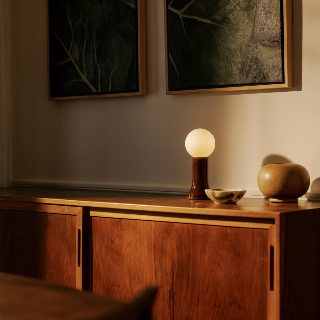 Tala Shore Table Lamp in Bottle Brown in a styled interior setting