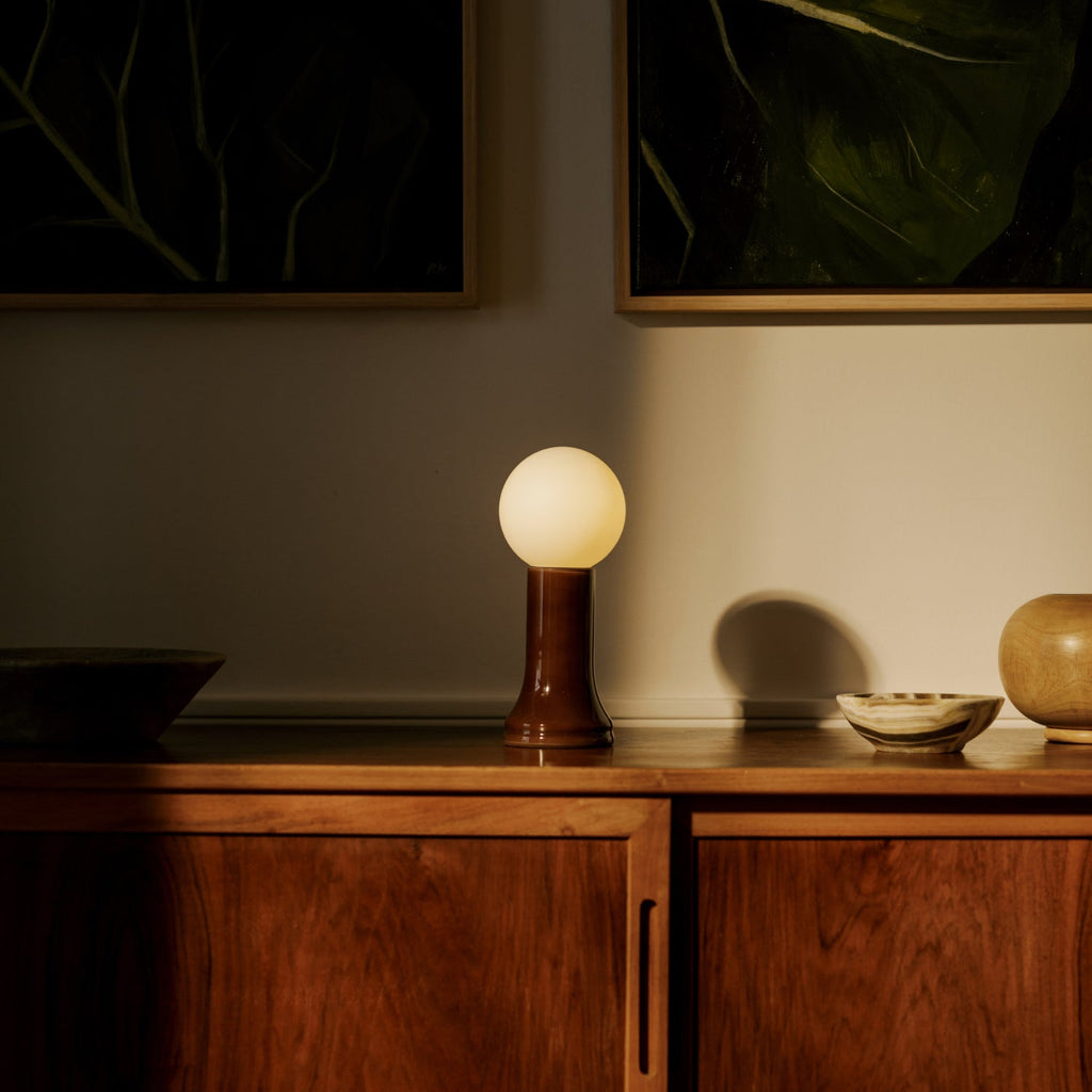 Tala Shore Table Lamp in Bottle Brown in a styled interior setting (view 2)