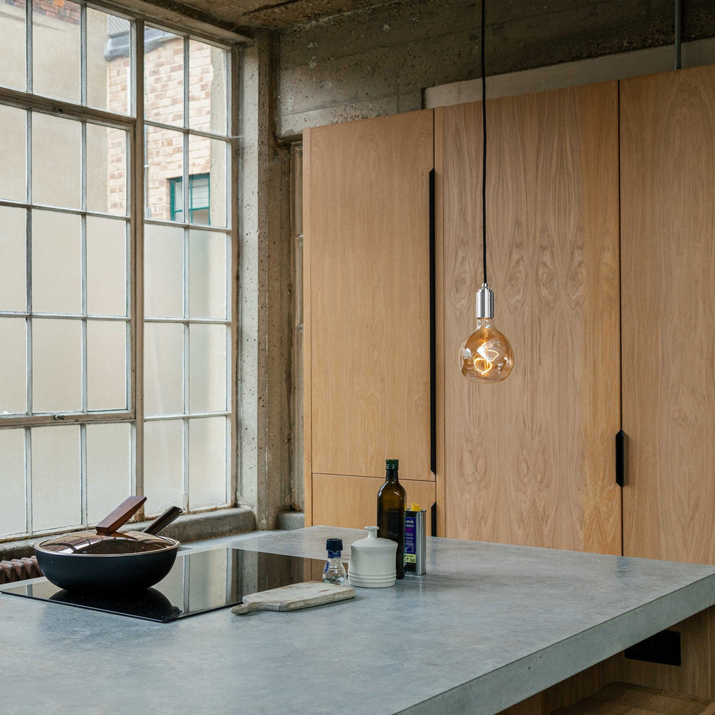 Tala Voronoi I Pendant Light in Stainless Steel in a styled interior setting