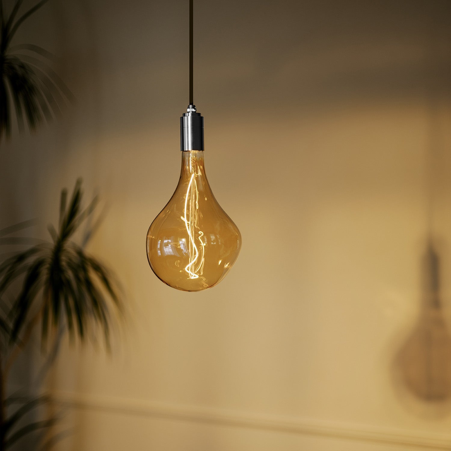 Tala Stainless Steel Pendant in a styled interior setting