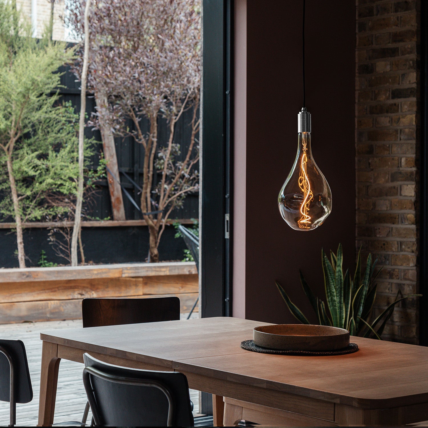 Tala Voronoi III Pendant Light in Stainless Steel in a styled interior setting