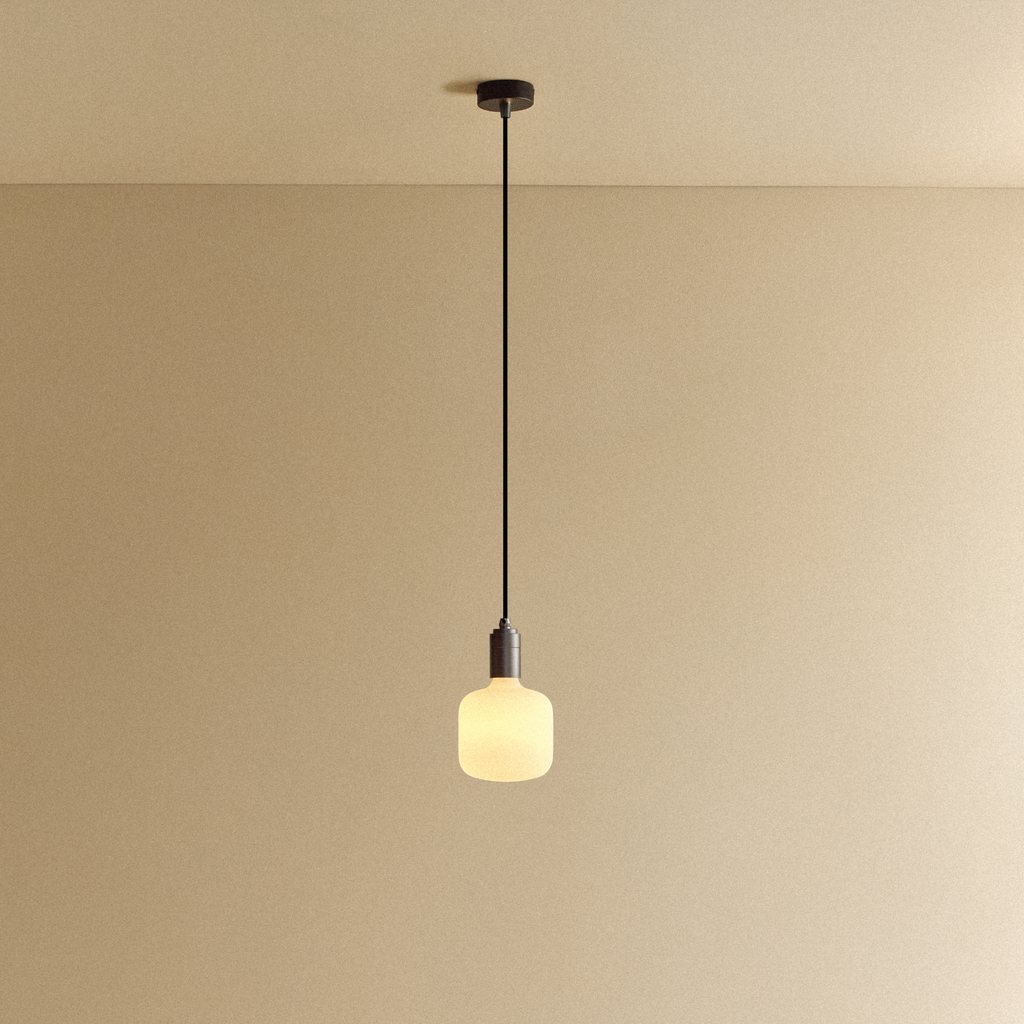 Tala Oblo Pendant Light in Graphite shown illuminated