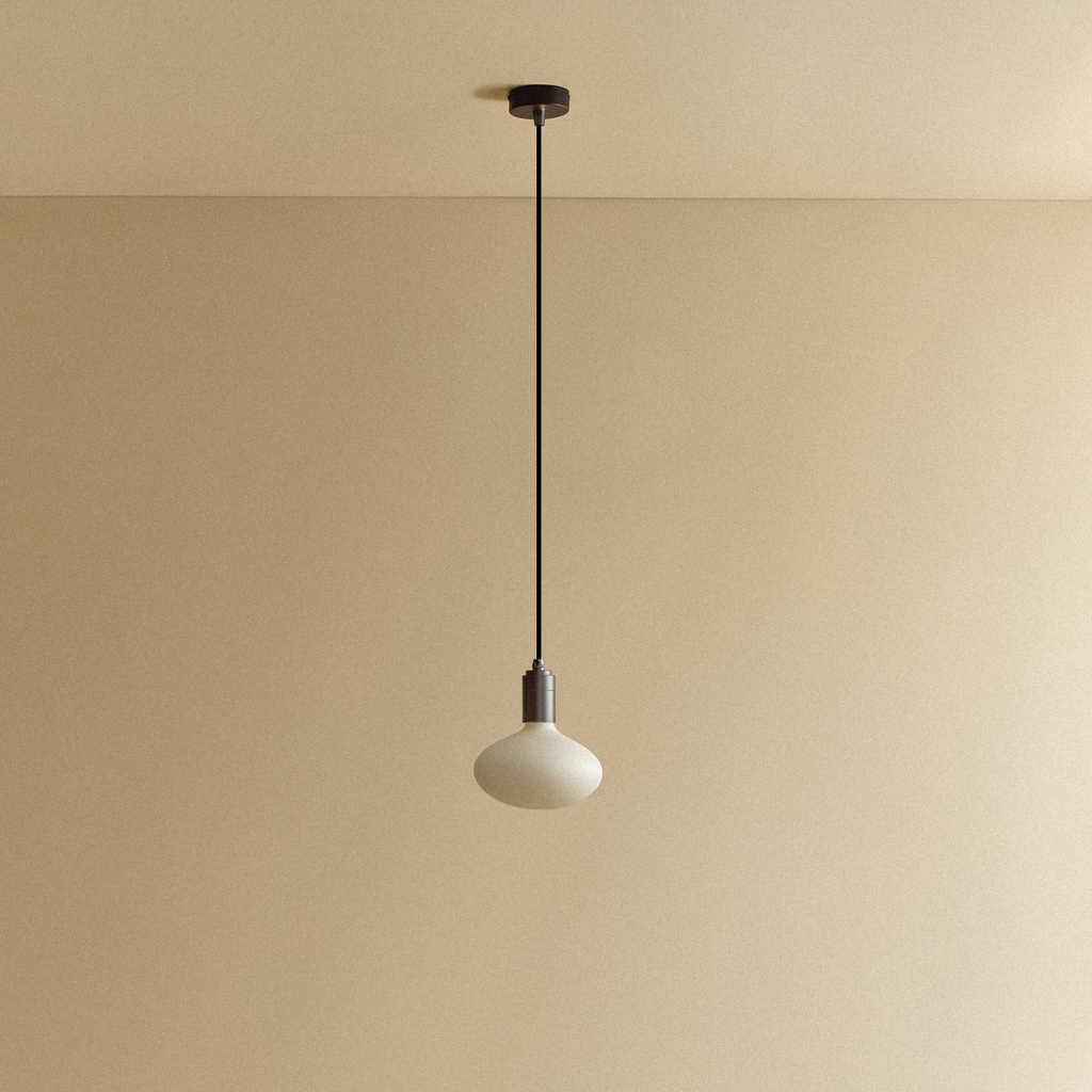 Tala Oval Dim-to-Warm Pendant Light in Graphite shown unlit
