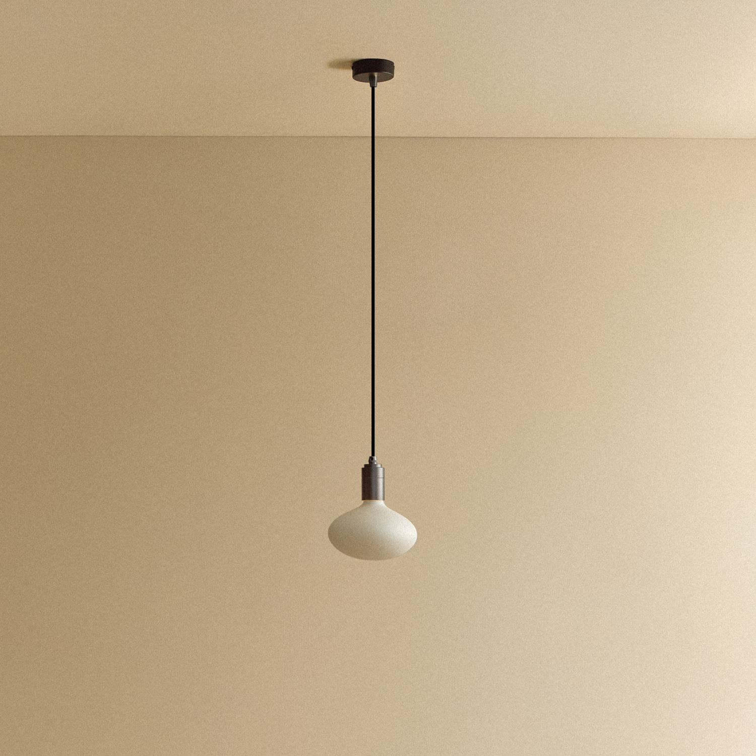 Tala Oval Dim-to-Warm Pendant Light in Graphite shown unlit
