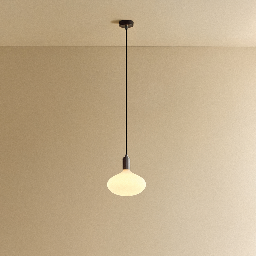 Tala Oval II Pendant Light in Graphite shown illuminated