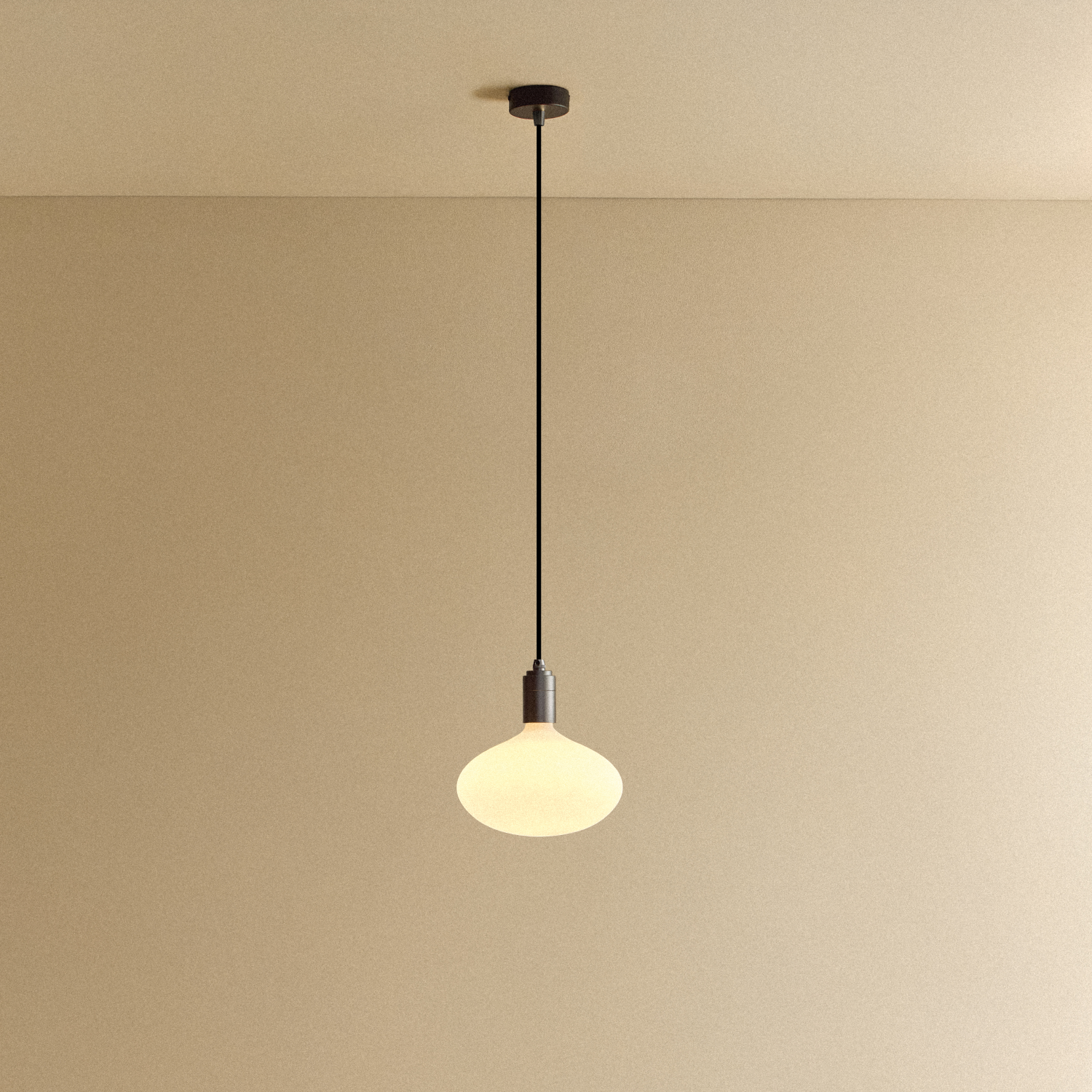 Tala Oval II Pendant Light in Graphite shown illuminated