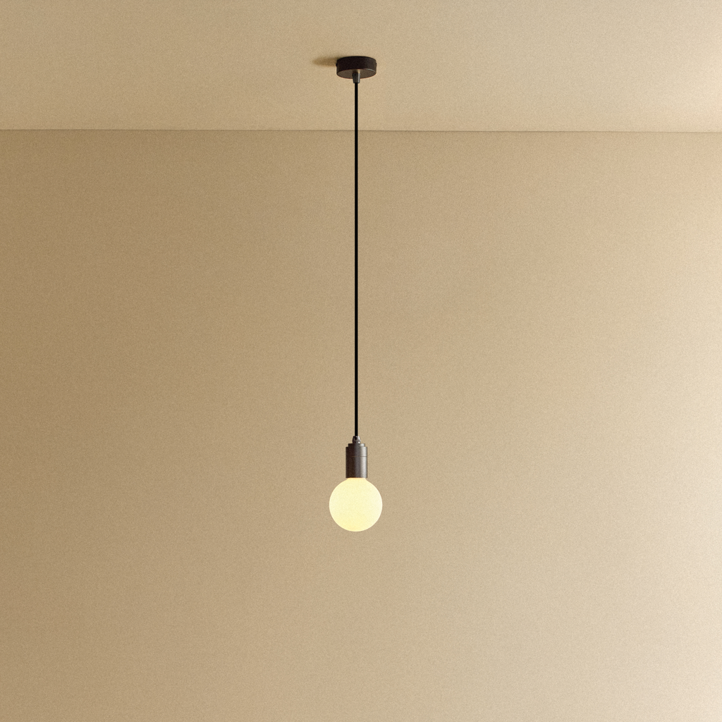 Tala Porcelain II Pendant Light in Graphite shown illuminated