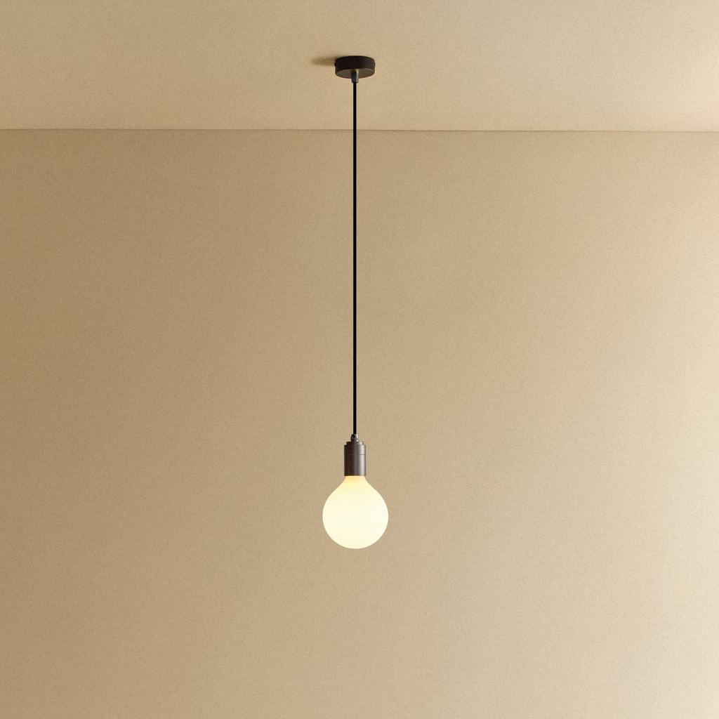 Tala Porcelain III Pendant Light in Graphite shown illuminated