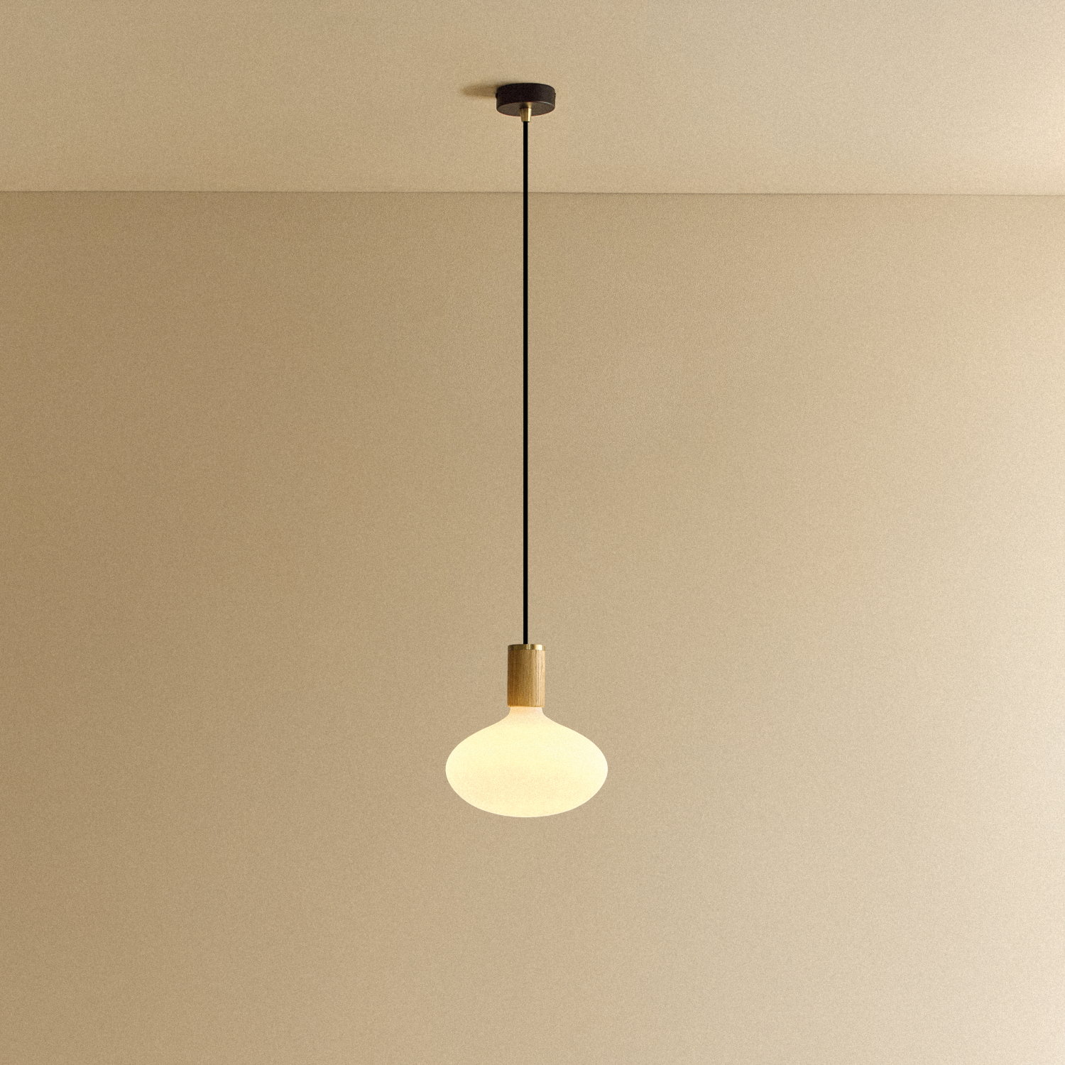 Tala Oval II Pendant Light in Oak shown illuminated