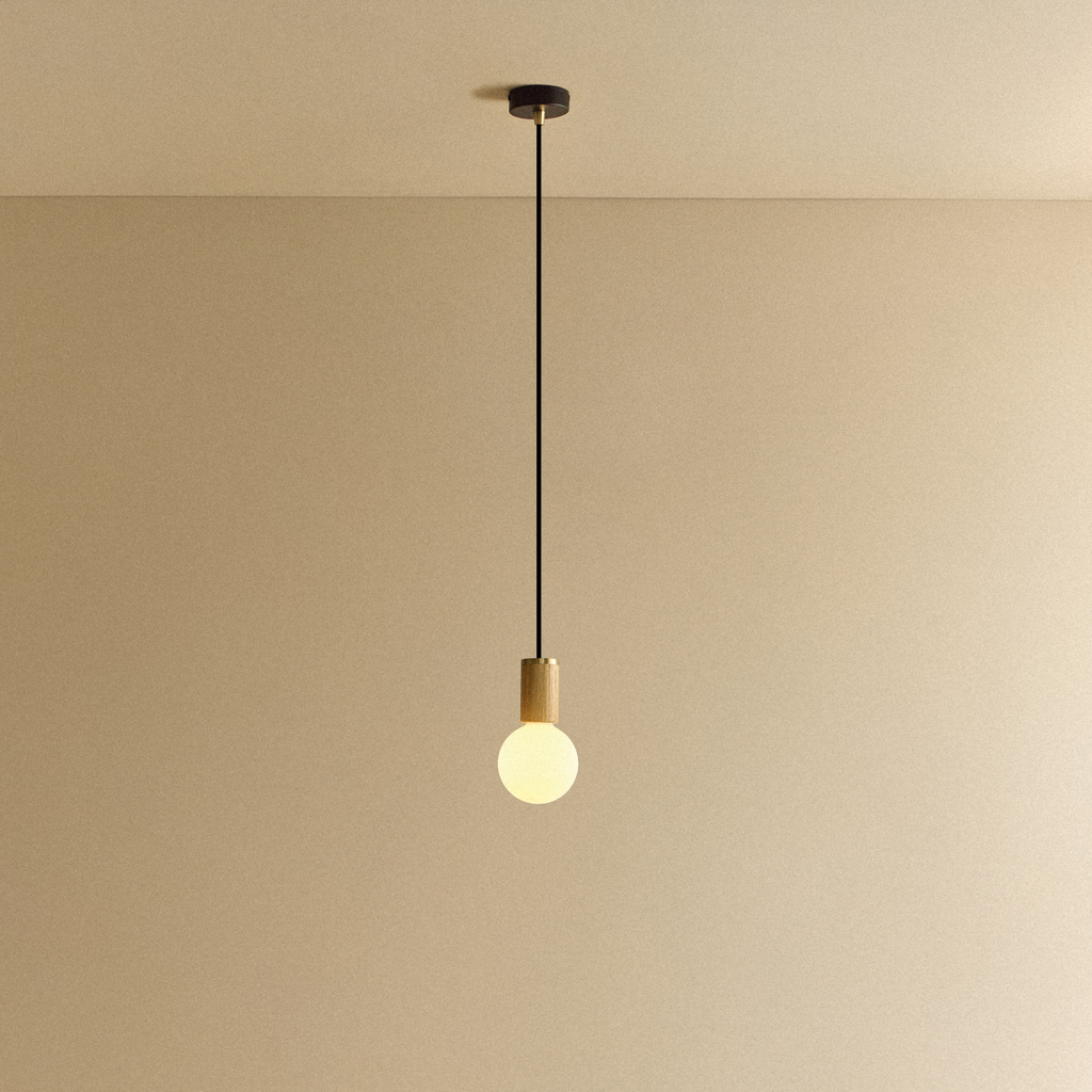 Tala Porcelain II Pendant Light in Oak shown illuminated