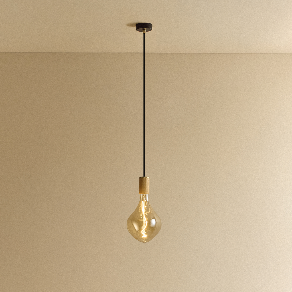 Tala Voronoi II Pendant Light in Oak shown illuminated