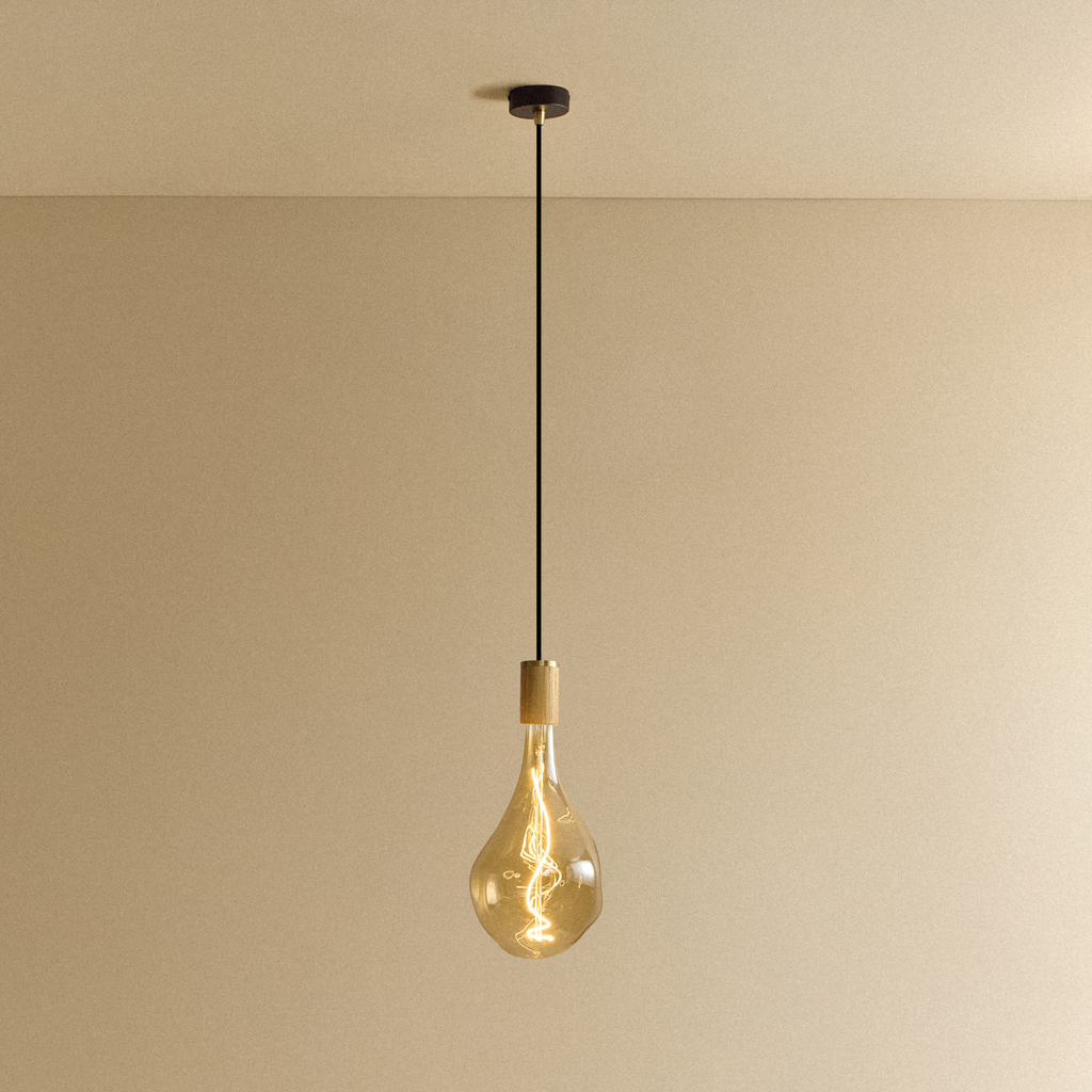 Tala Voronoi III Pendant Light in Oak shown illuminated