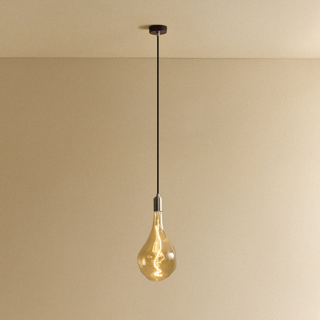 Tala Voronoi III Pendant Light in Stainless Steel shown illuminated