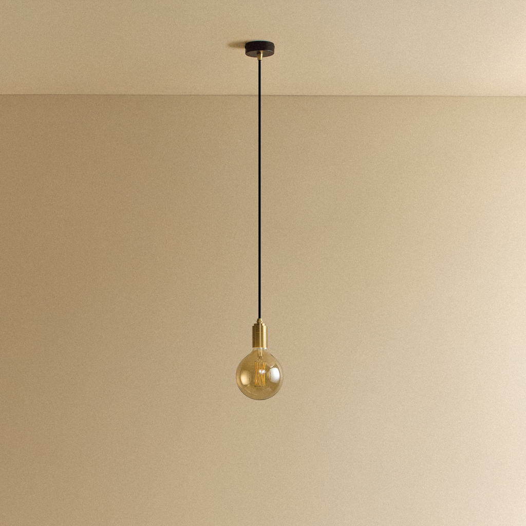 Tala Gaia Pendant Light in Brass shown unlit
