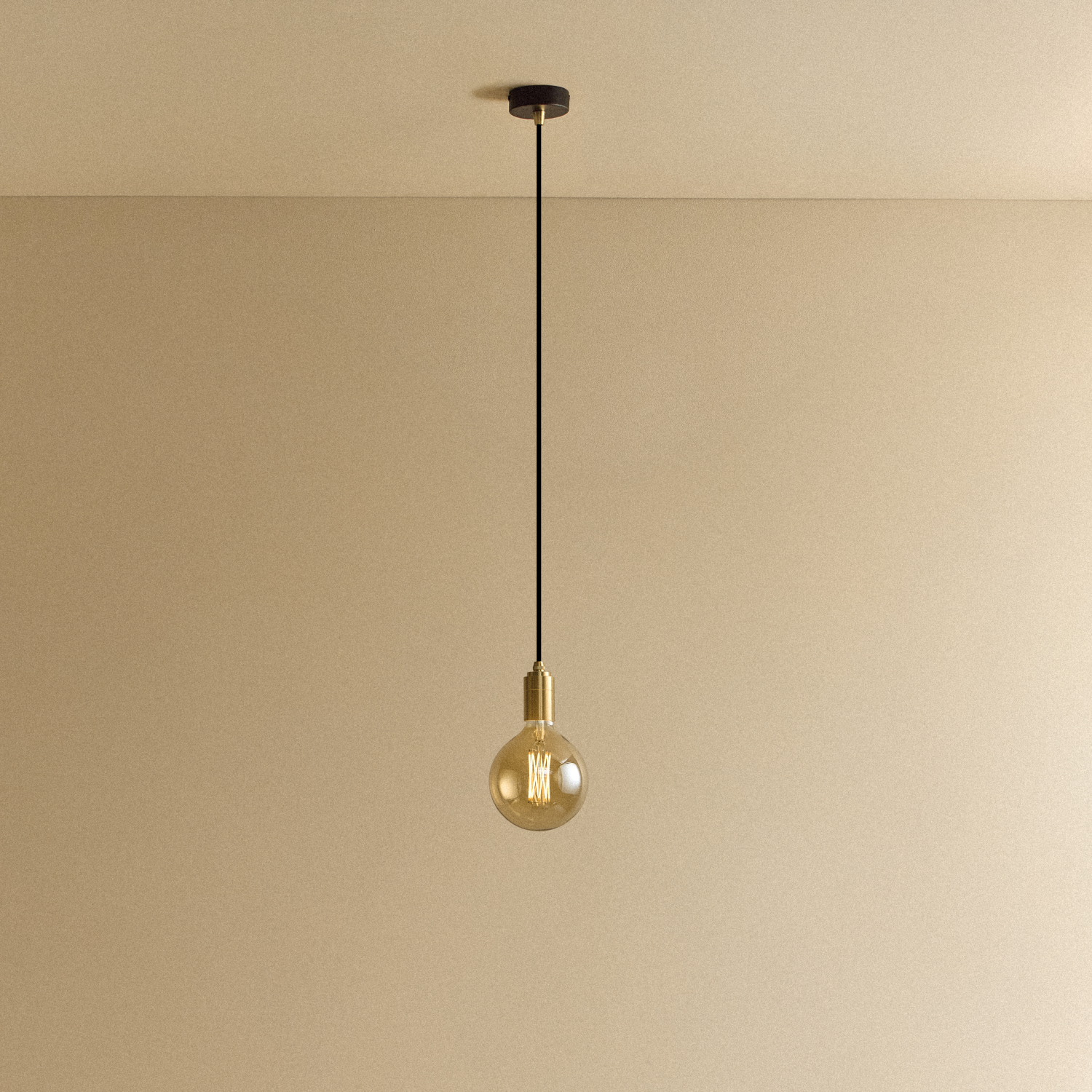 Tala Gaia Pendant Light in Brass shown illuminated