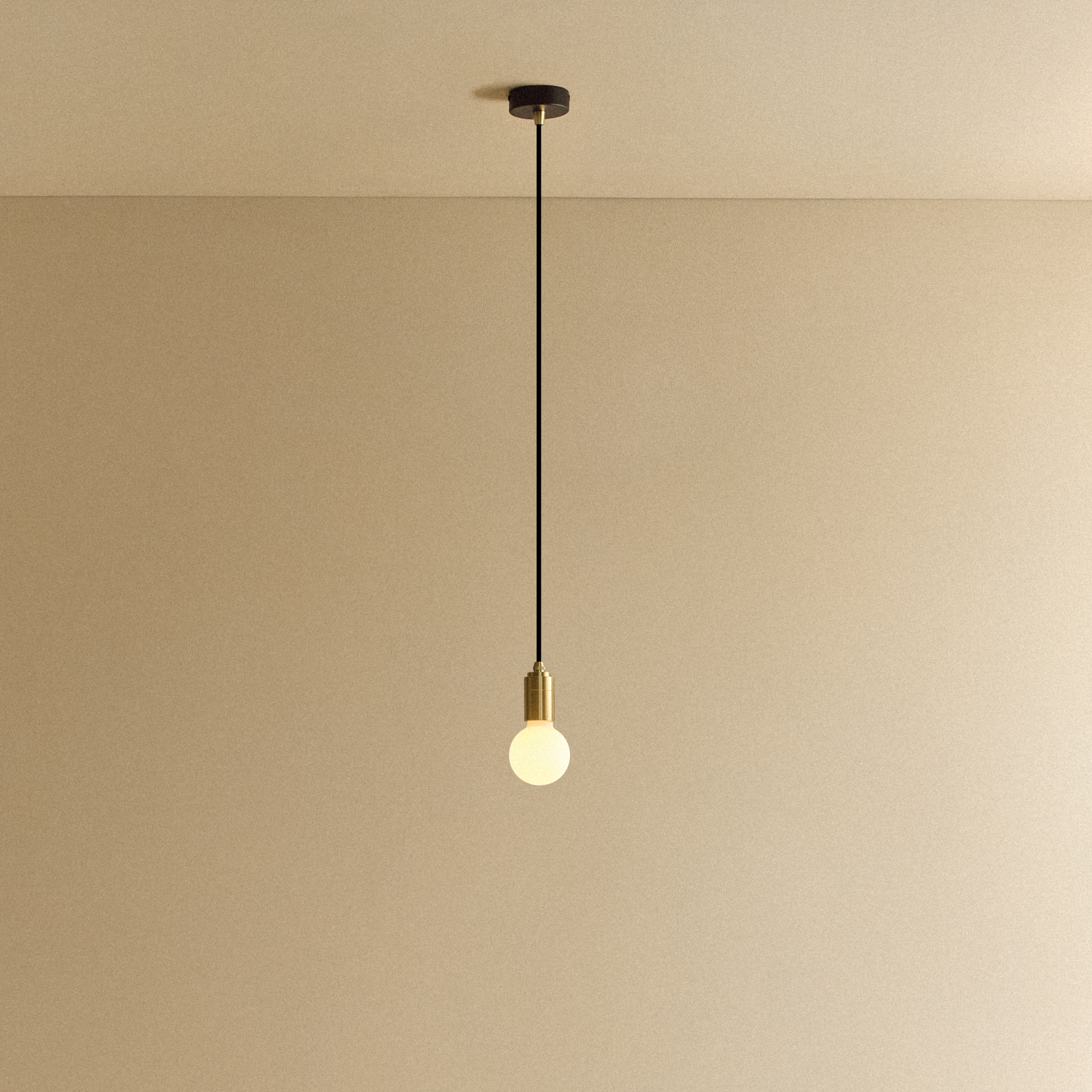 Tala Sphere II Pendant Light in Brass shown illuminated