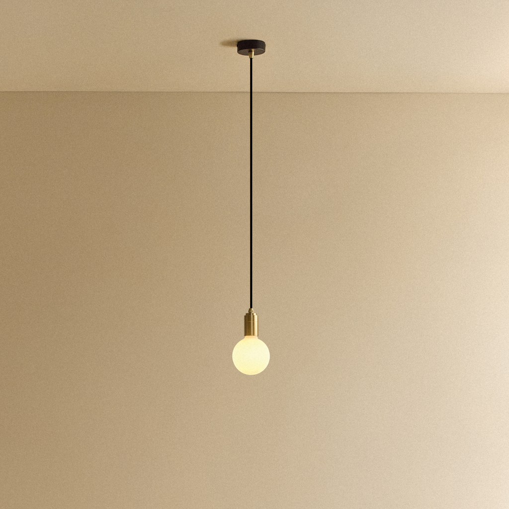 Tala Sphere III Pendant Light in Brass shown illuminated